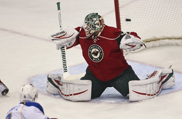 The puck flew over the shoulder of Wild goalie Niklas Backstrom for a St. Louis goal in the first period of a Minnesota Wild verses St. Louis Blues NH