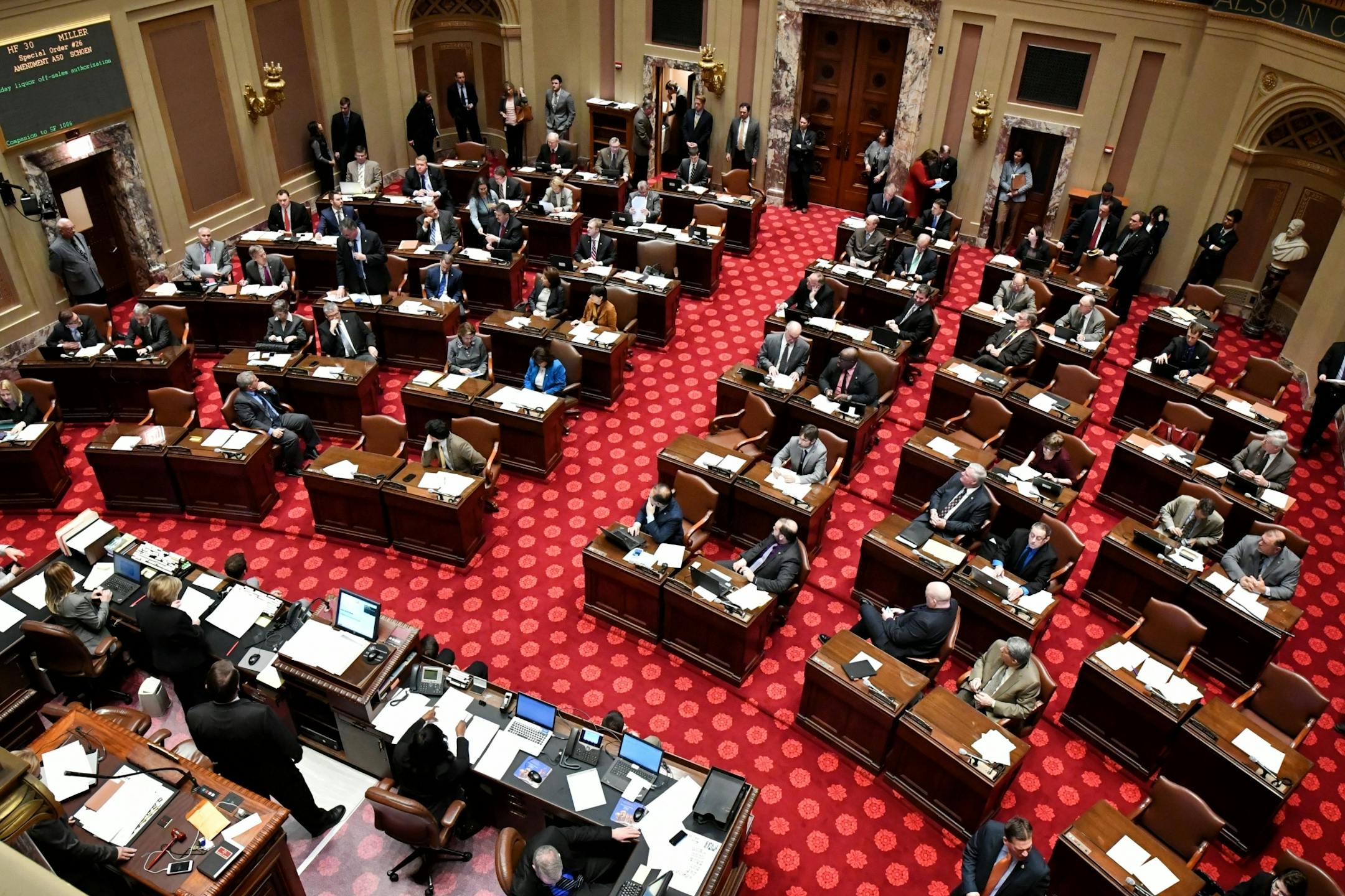 Bill to repeal the ban on Sunday liquor store sales hits the Senate floor.