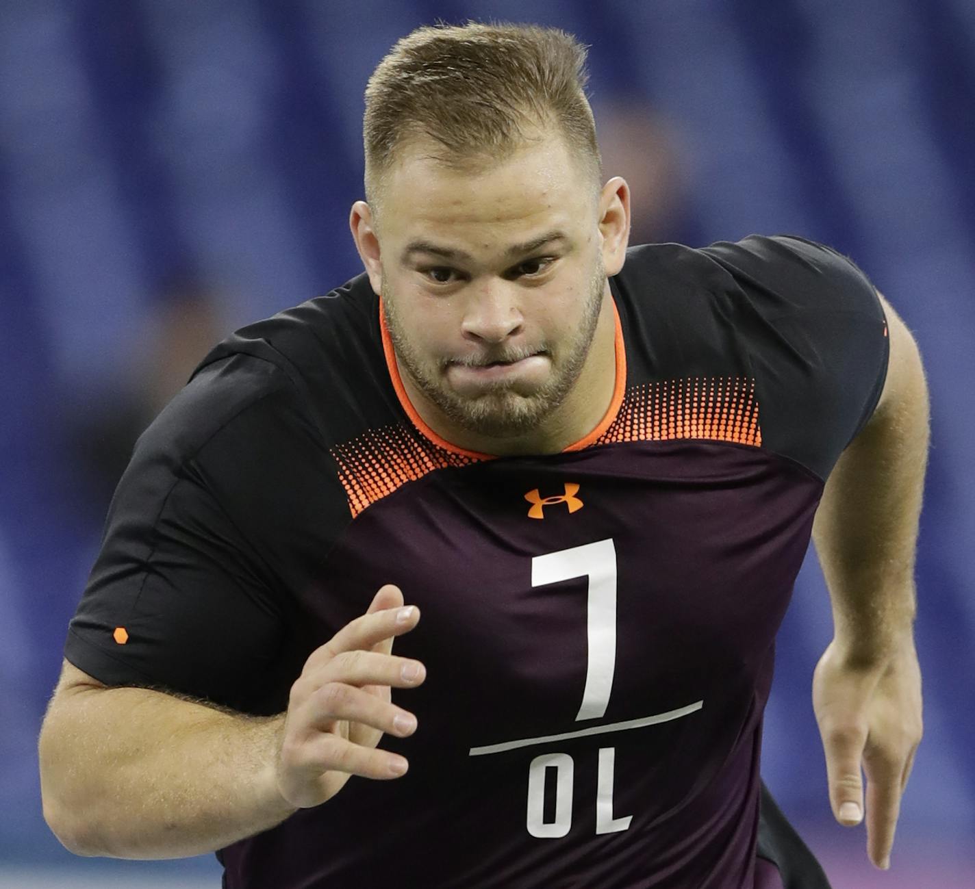 NC State offensive lineman Garrett Bradbury runs a drill during the NFL football scouting combine, Friday, March 1, 2019, in Indianapolis. (AP Photo/Darron Cummings) ORG XMIT: INDC1