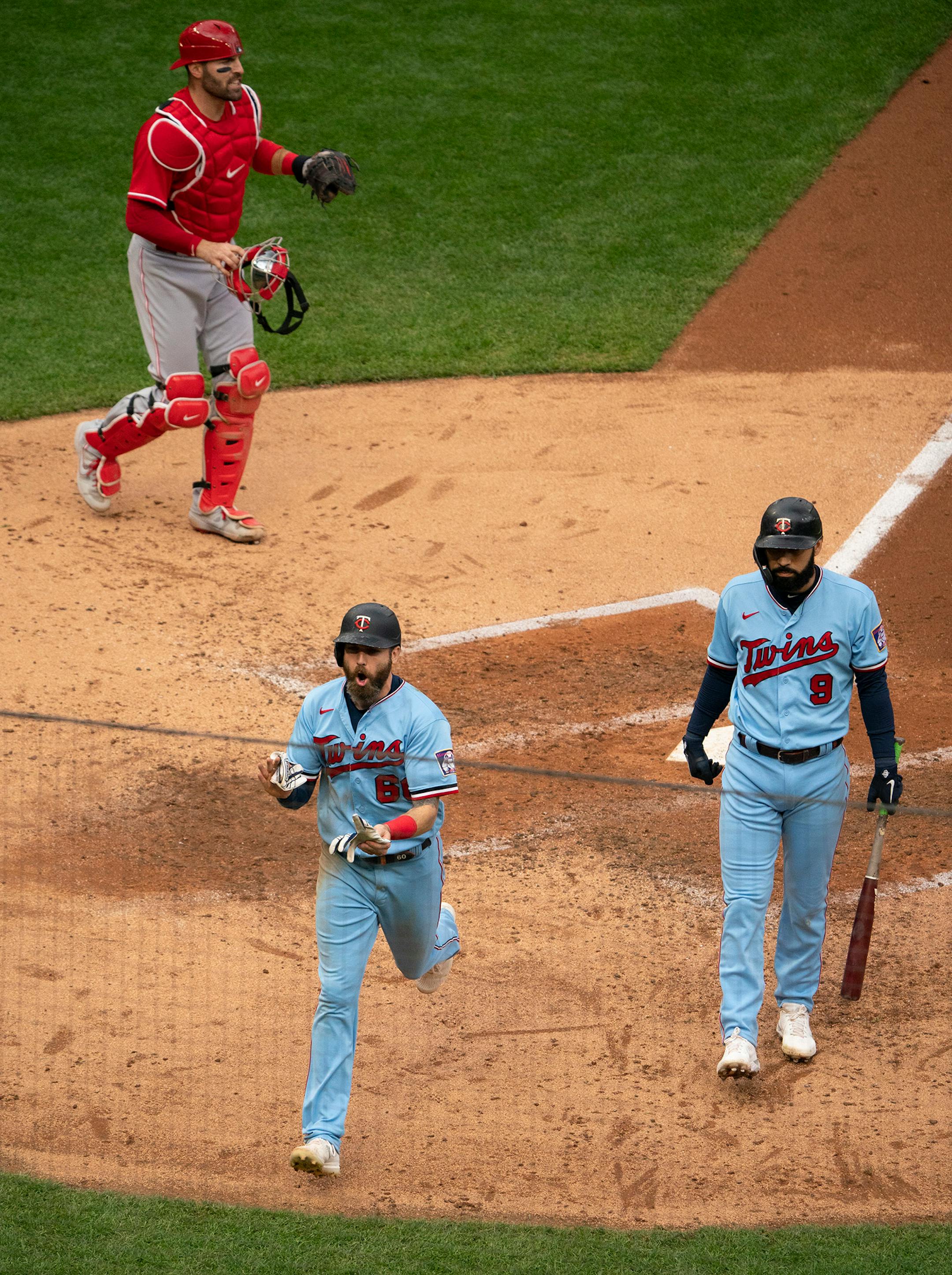 With Minnesota Twins third baseman Marwin Gonzalez (9) batting, the home plate umpire sent Minnesota Twins center fielder Jake Cave (60) home from third base on a balk by Cincinnati Reds starting pitcher Sonny Gray (54) in the fifth inning.