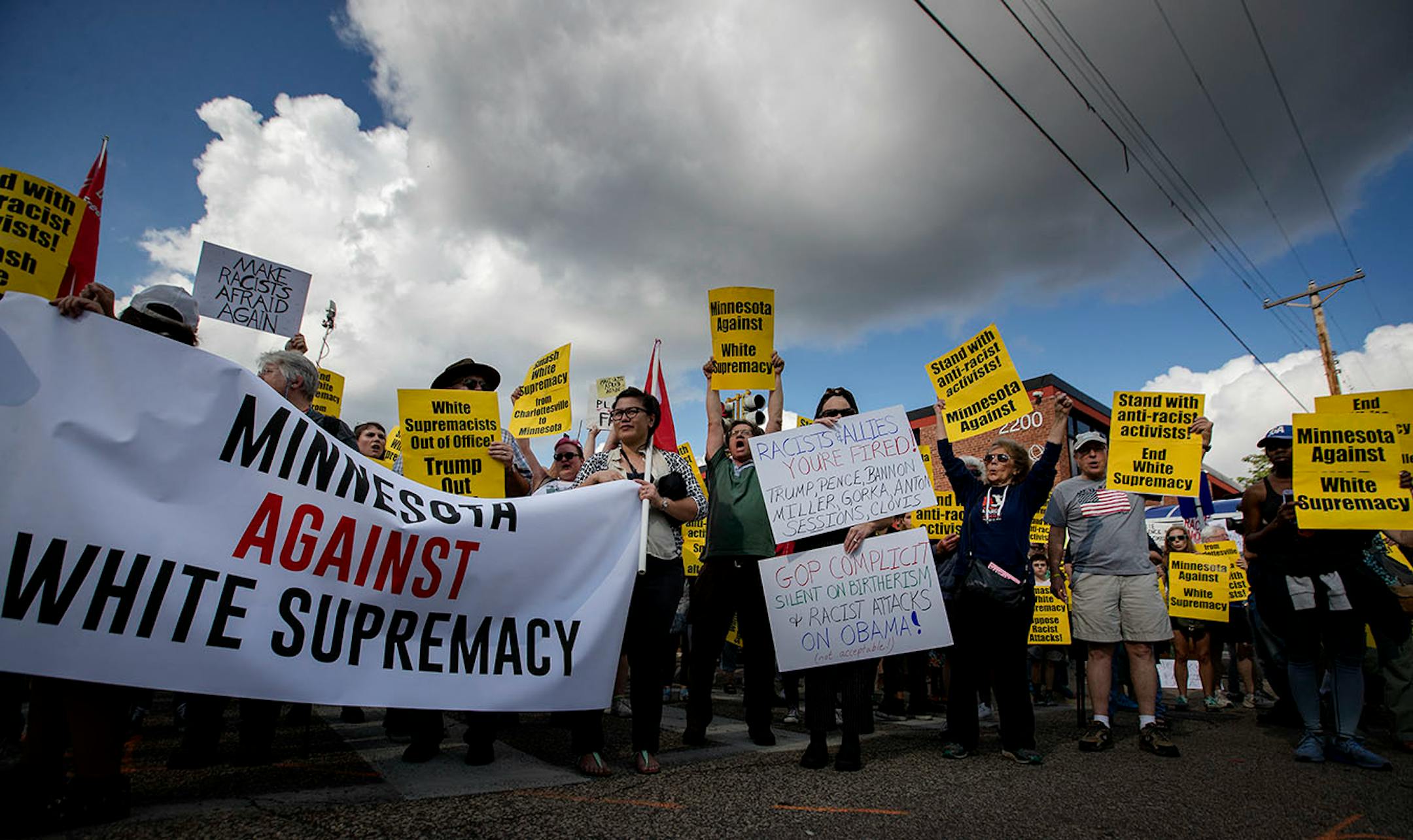 Demonstrators gathered at the Solidarity with anti-racists in Charlottesville in front of the Minneapolis Republican Party office on Franklin Avenue on Monday.