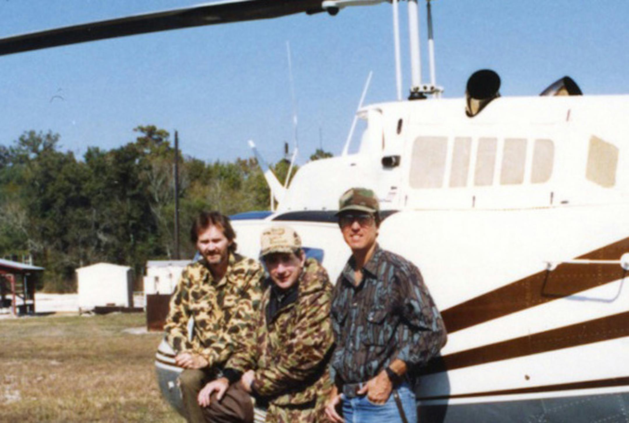In this 1989 photo, L-R, outdoors writer Dennis Anderson, and the late Dave Hall and Bill Mellor, two former U.S. Fish and Wildlife agents, stood before a helicopter purchased mostly from donations by Minnesota waterfowlers.
