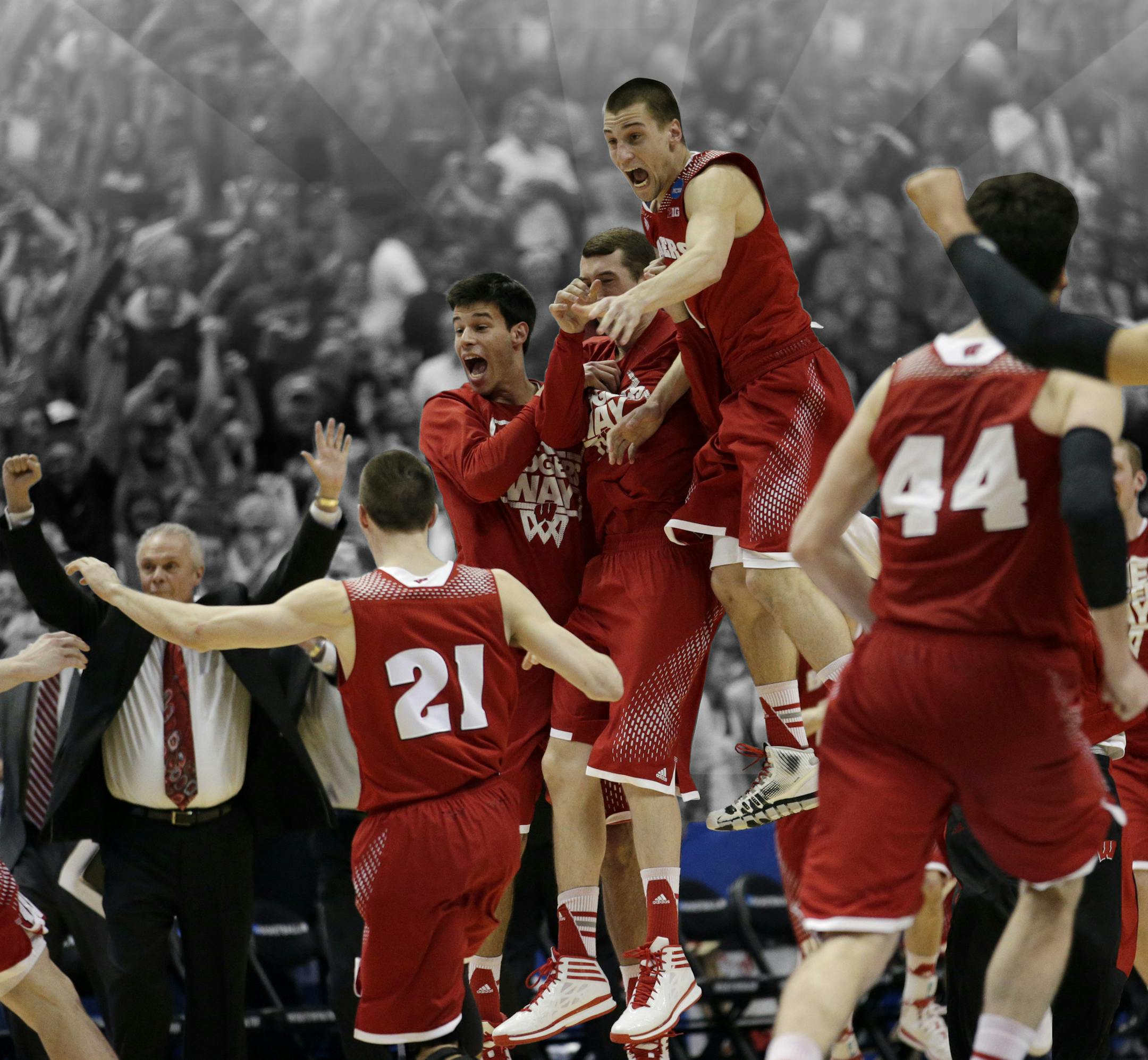Wisconsin players react as time runs out in overtime in a regional final NCAA college basketball tournament game, Saturday, March 29, 2014, in Anaheim, Calif. Wisconsin won 64-63 in overtime. (AP Photo/Jae C. Hong) ORG XMIT: INMG137
