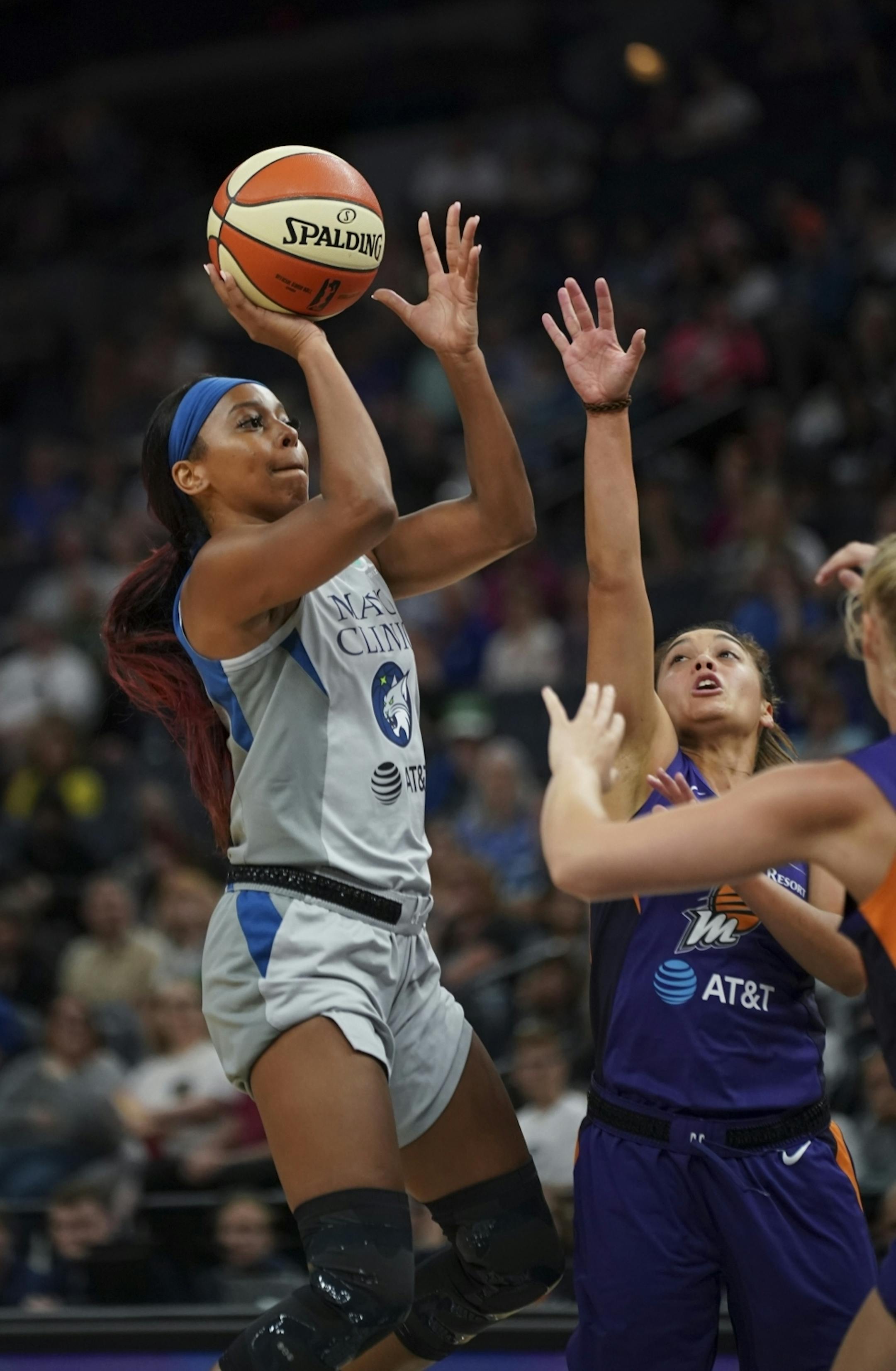 Minnesota Lynx guard Lexie Brown shot over the Phoenix Mercury's Leilani Mitchell in the fourth quarter. She finished with 12 points for the night.
