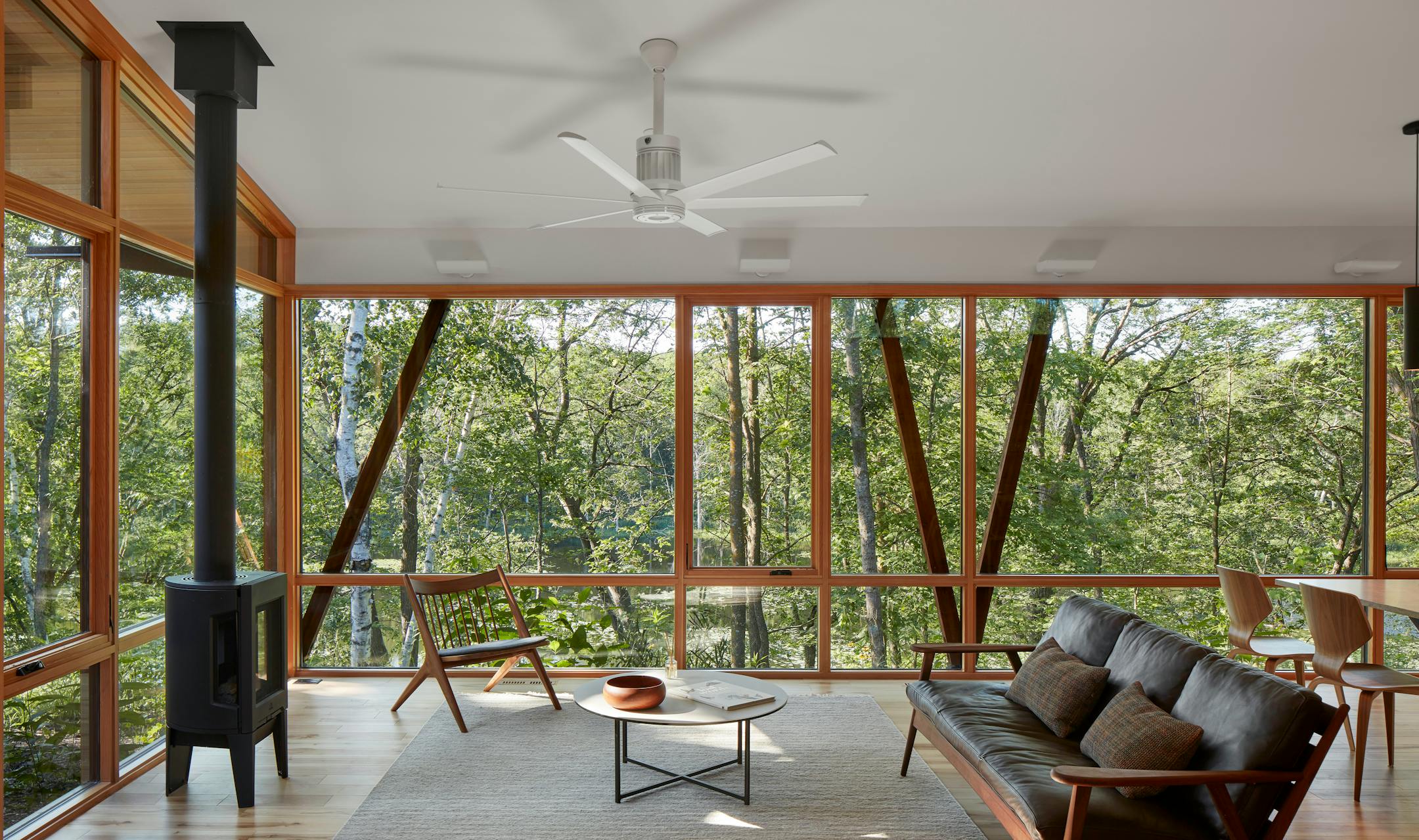 Set against a backdrop of rolling hills and prairie, SALA Architect's Home of the Month winning retreat is an restorative getaway in Frederic, Wis. that also restores the land.