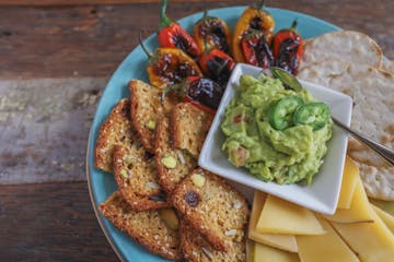 Roasted mini-bell peppers perk up an appetizer plate, and pair well with smooth guacamole.