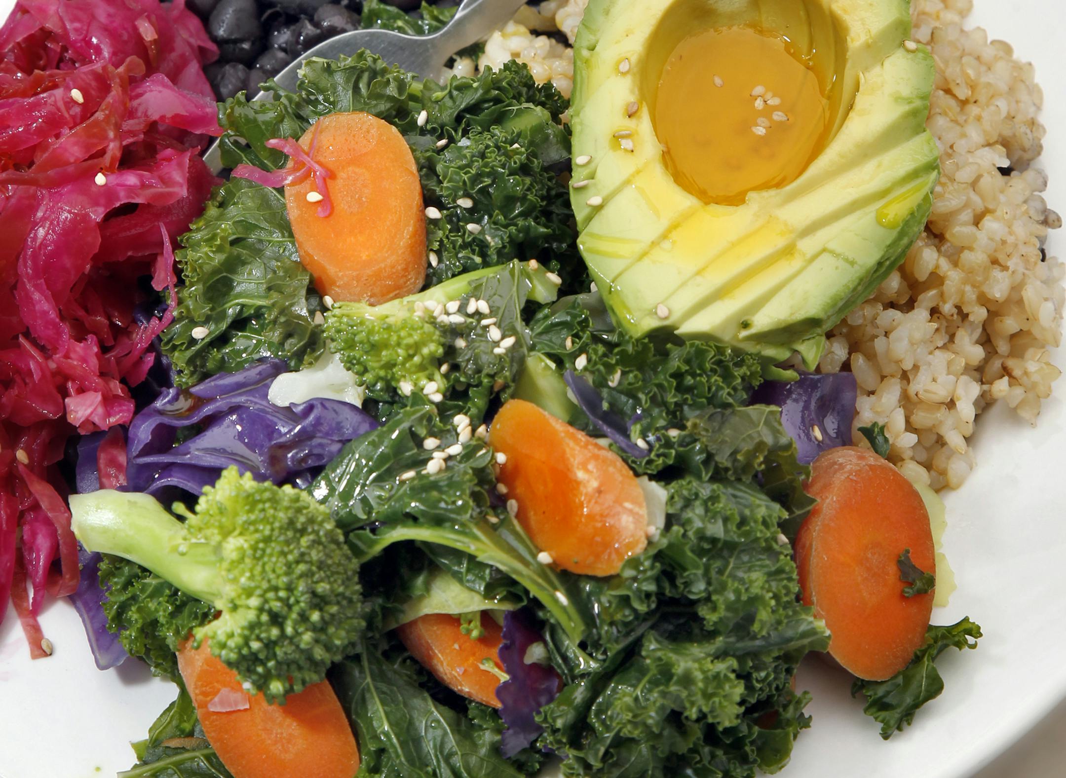 There is still a kind of feel of a retro 1970's style to Tao, an organic deli and shop on the corner of 22nd and Hennepin Ave. The The owners are sister Anna Needham and Christina Badger are bringing healthy food to the market staying with whats fresh on the market daily. The food: The Royal V, A staff favorite, steamed veggies, black beans, avacado, sauerkraut and flax seed oil, sreved on a bed of brown rice.[ TOM WALLACE ‚Ä¢ twallace@startribune.com _ Assignments #20023663A_ M