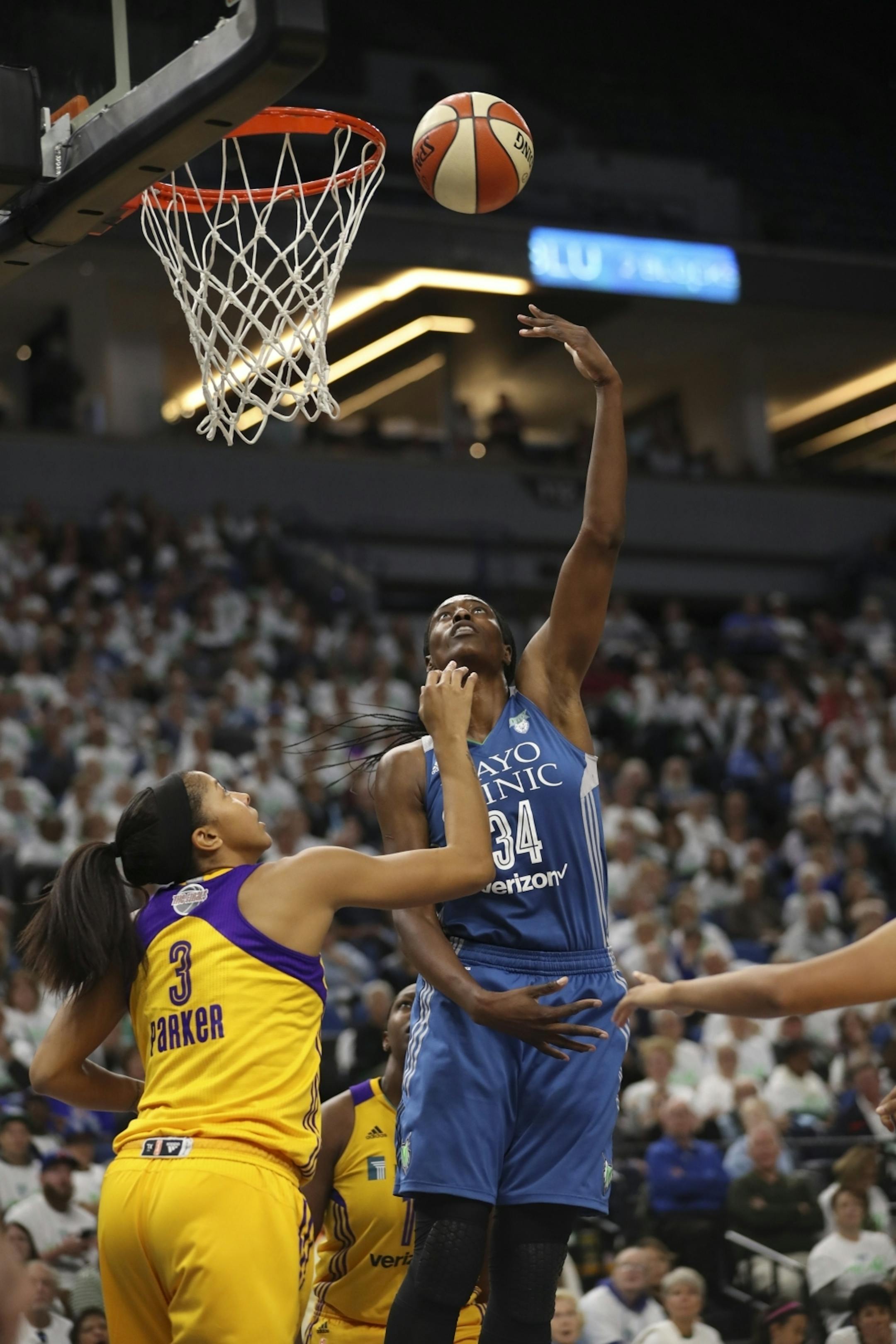 Minnesota Lynx center Sylvia Fowles (34) shot over Los Angeles Sparks forward Candace Parker (3) in the second half. She finished with 18 points in the game.