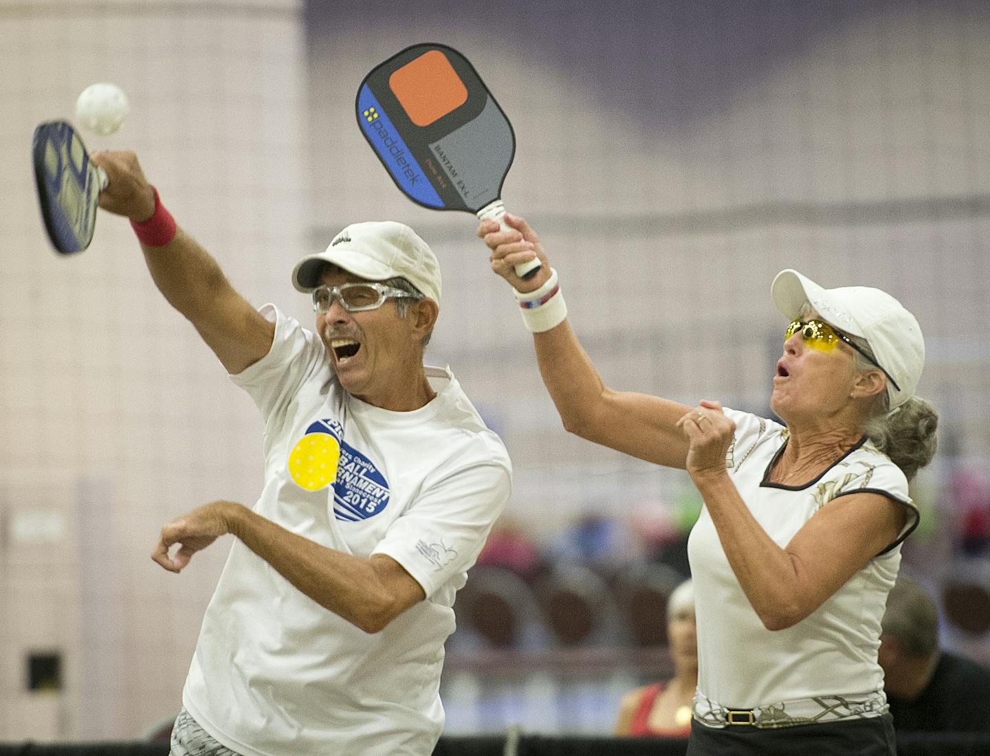 Marc and Diane Bock competed in an elimination round of pickleball in the age 60-64 age group Sunday at the National Senior Games. ] Aaron Lavinsky &#x2022; aaron.lavinsky@startribune.com The National Senior Games took place at the Minneapolis Convention Center on Sunday, July 12, 2015. We focus on Marc and Diane Bock, just two of more than 100 senior athletes who traveled from the Villages in Florida to compete in this year's games. ORG XMIT: MIN1507121556500270