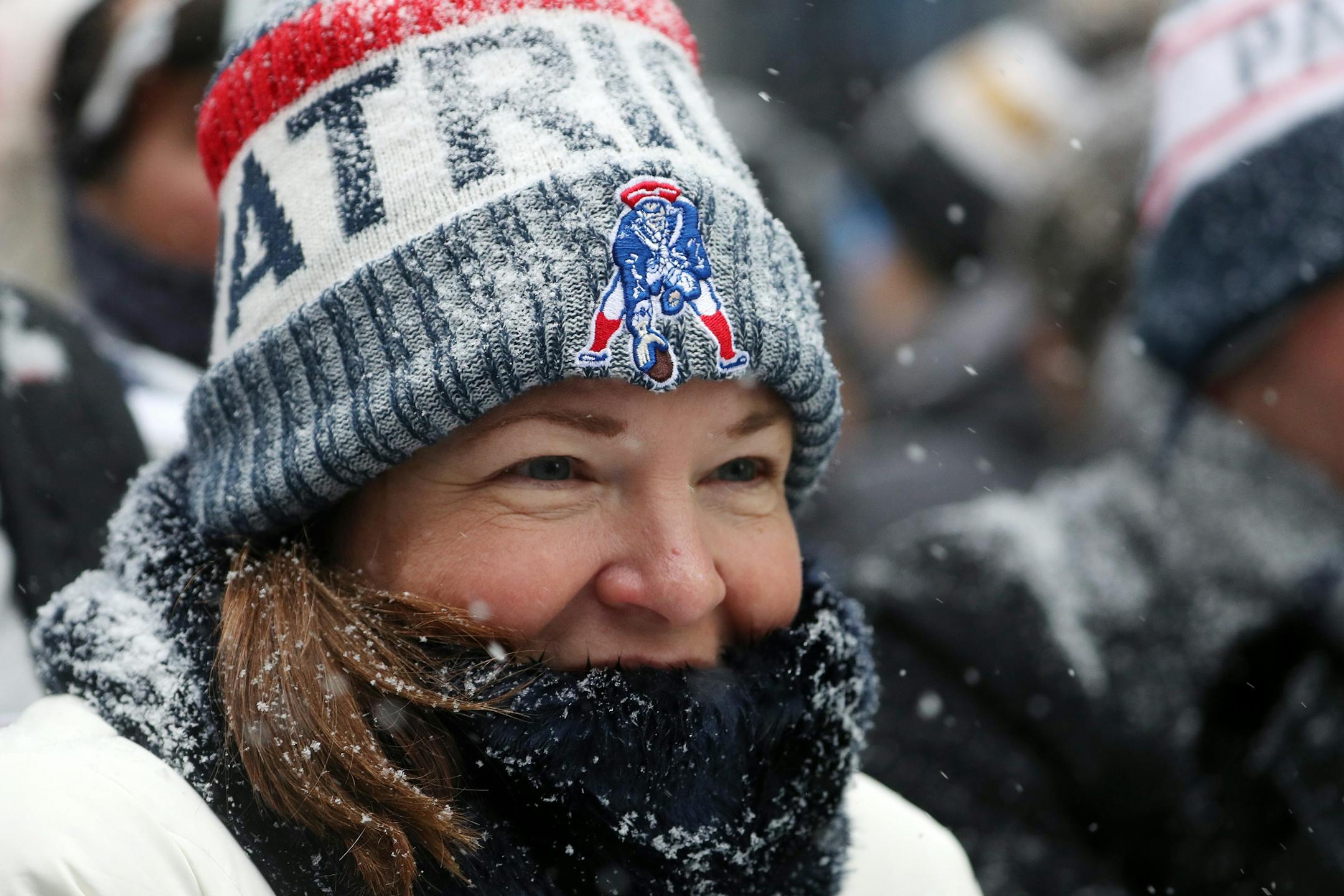Kerri Hanson of Seaton, Fla. stood bundled up in Patriots gear during the team's rally Saturday on Nicollet Mall.