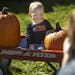 Henry Isaacson made the most of his pumpkin portrait session at Anoka County Farms.