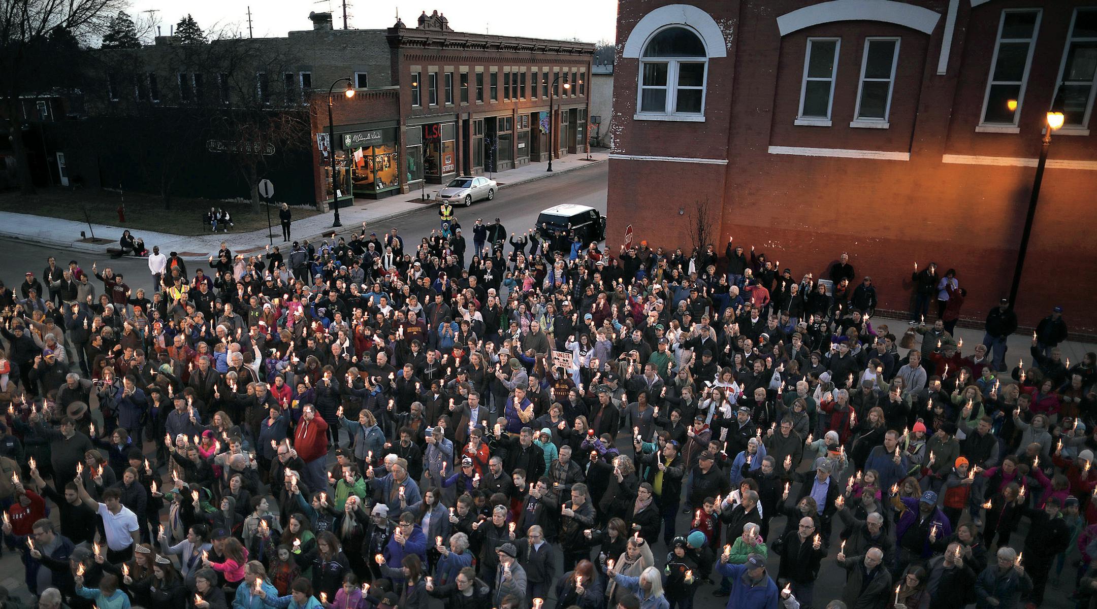 A portion of the more than 1000 people who attended the vigil in Delano Sunday night as they held their candles aloft.