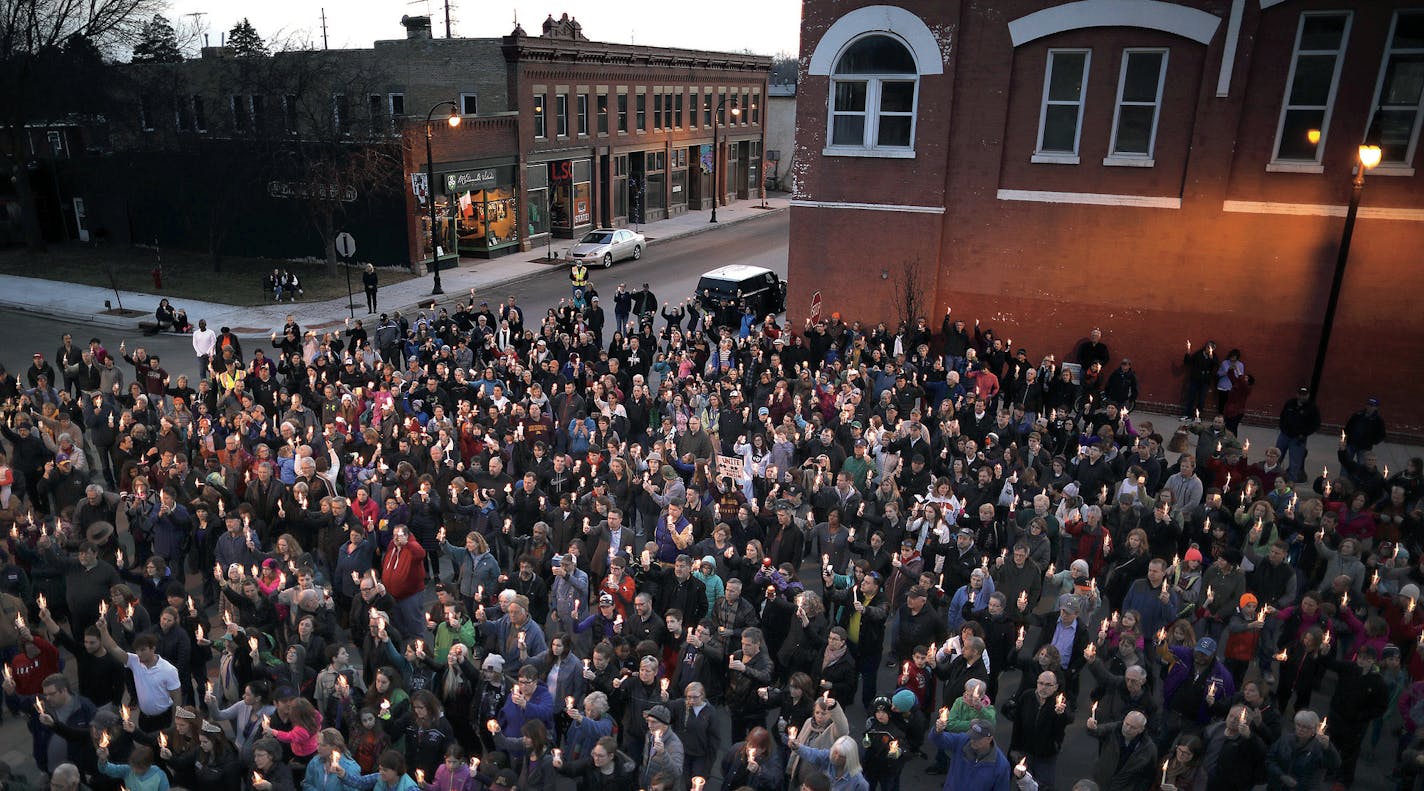 A portion of the more than 1000 people who attended the vigil in Delano Sunday night as they held their candles aloft.