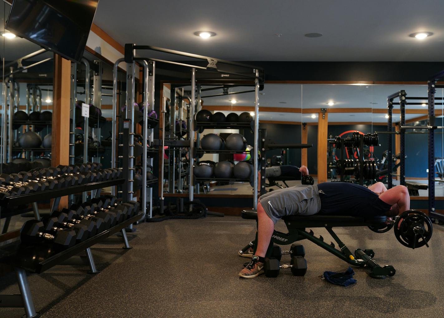 Residents used the gym facilities at The Loden. ] ANTHONY SOUFFLE &#x2022; anthony.souffle@startribune.com Life at The Loden, a new apartment complex with high end amenities that filled up in three months, Thursday, May 23, 2019 in Shoreview, Minn. The city used a PUD to get around existing suburban rules and build to meet market demand.