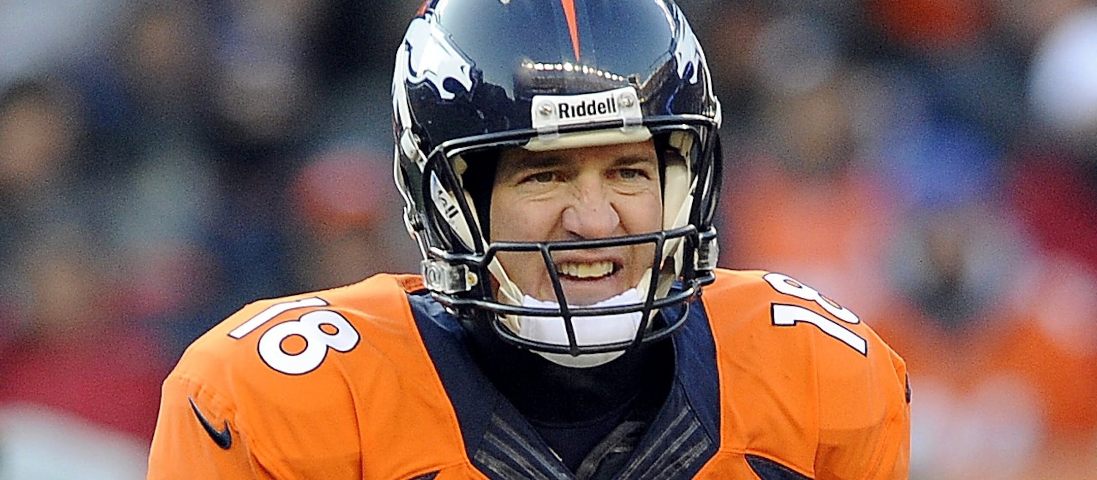 Denver Broncos quarterback Peyton Manning during the first half of an NFL football game against the Tennessee Titans on Sunday, Dec. 8, 2013, in Denver. (AP Photo/Chris Schneider)