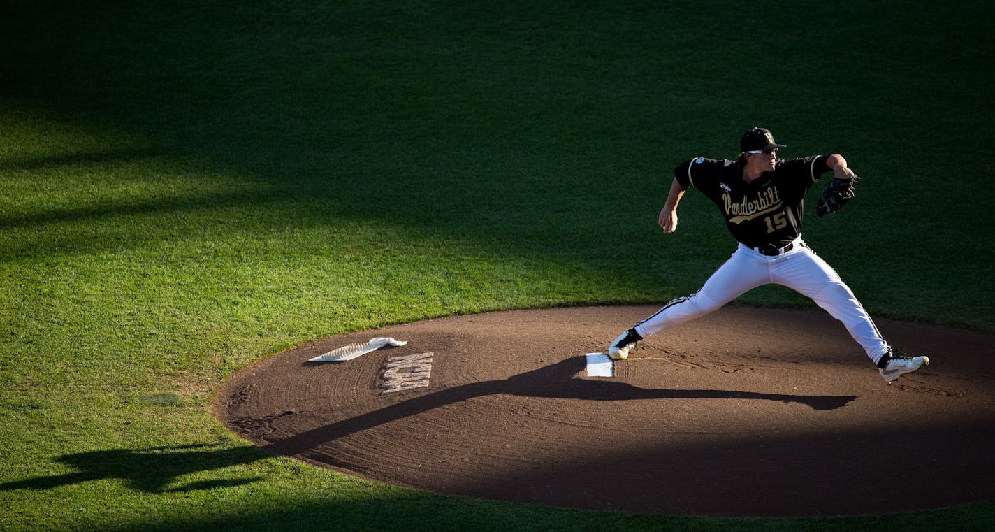 Vanderbilt starter Carson Fulmer pitches in the first inning against Texas in an NCAA College World Series baseball game in Omaha, Neb., on Saturday, June 21, 2014. (AP Photo/The World-Herald, Matt Miller) MAGAZINES OUT; ALL NEBRASKA LOCAL BROADCAST TELEVISION OUT