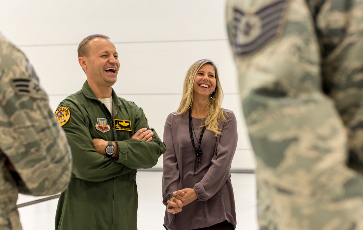 Lt. Col. Curt Grayson (left) and his wife Sheri Grayson spoke about how excited and proud they are for this new venture, how close they are and how technology has helped their four sons with facetime while their dad is deployed. ] Elizabeth Brumley special to the Star Tribune * Airmen of the Duluth-based 148th Fighter Wing hold a press conference about their upcoming deployment to South Korea