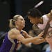 Seimone Augustus looked for a path to the basket with the Mercury's Penny Taylor defending during the first half Thursday at Target Center. Augustus f