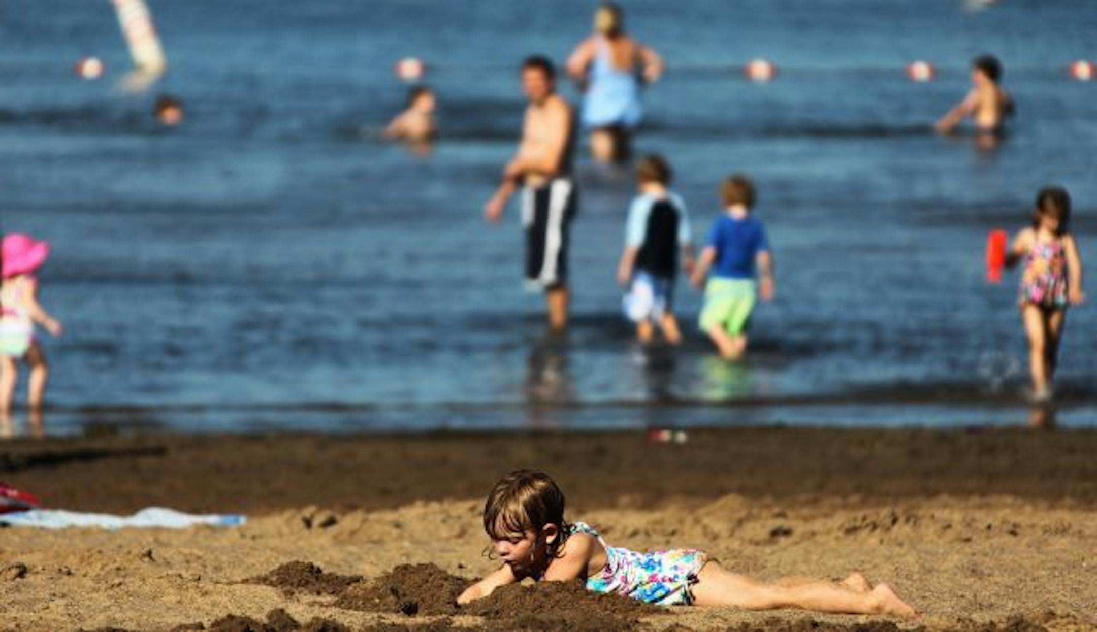 Sofia Cousins, 3, enjoyed playing in the sand at Big Marine Park on Sunday afternoon. Sofia was there with her mom Nancy, and sister Bella.