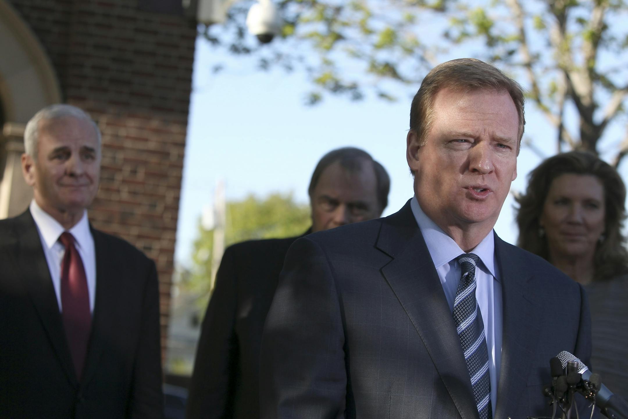NFL Commissioner Roger Goodell spoke to reporters after meeting with Gov. Mark Dayton, left background, and key legislators at the governor's residence.