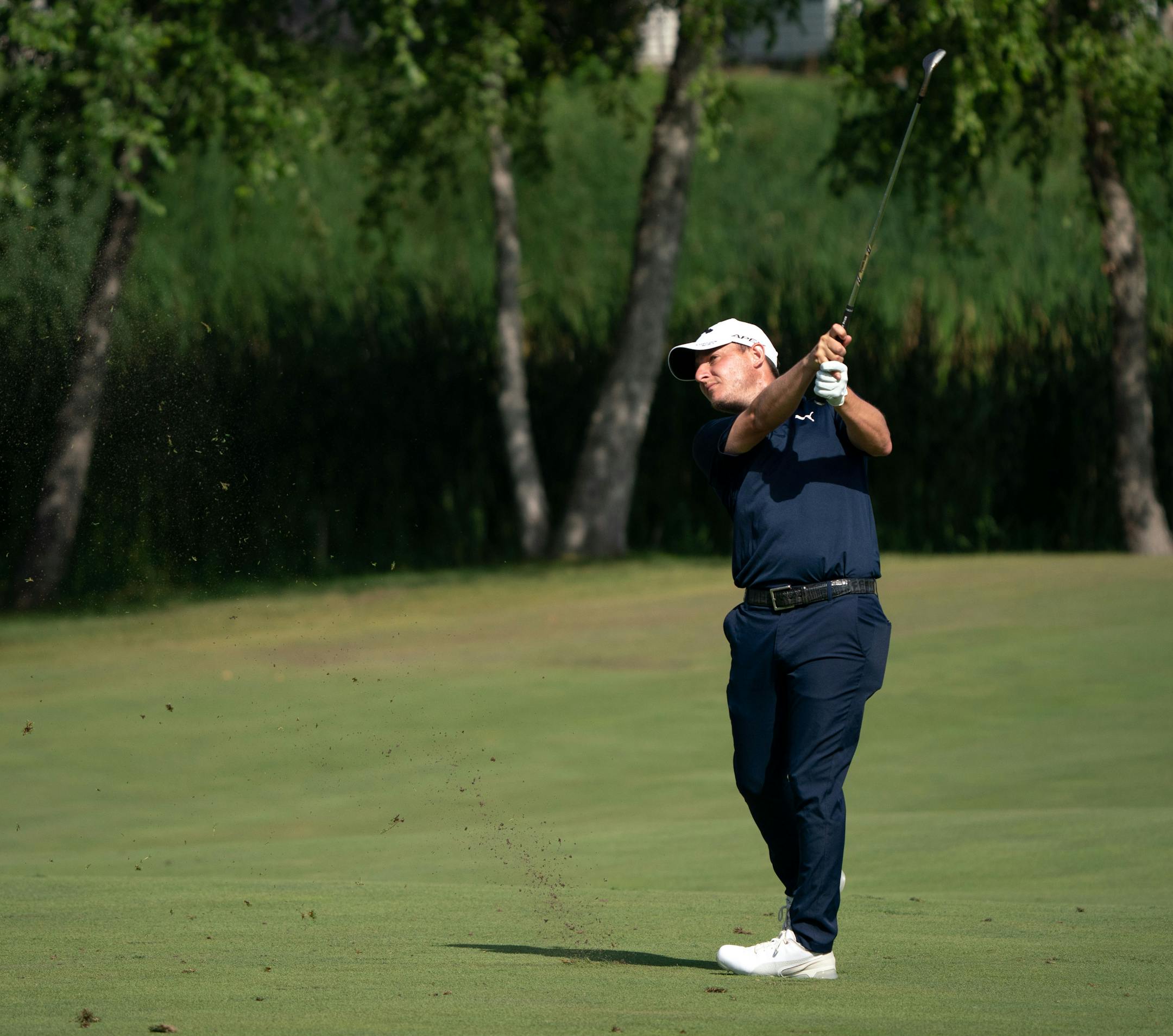 Emiliano Grillo takes a shot at 10th hole during the 3M Open.