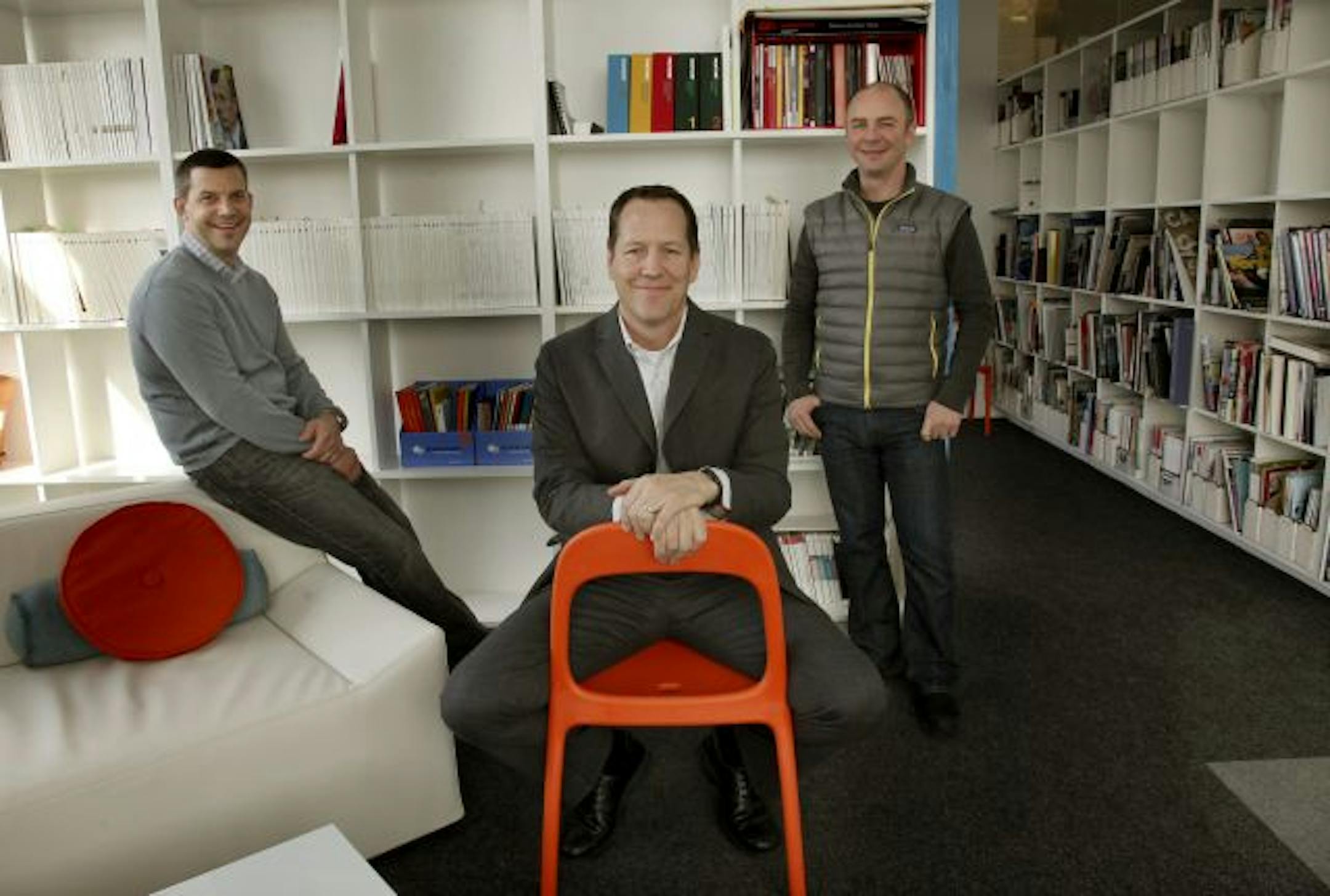 Mono founders Michael Hart, left, Jim Scott, center, and Chris Lange posed for a photo at their trendy Hennepin Avenue offices.