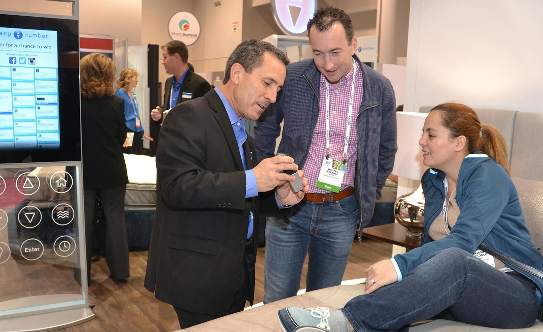 Pete Bils, left, Select Comfort&#x2019;s vice president of sleep innovation and research, demonstrated the new anti-snore feature of the new Sleep Number x12, a $7,999 luxury bed that took center stage Tuesday at the electronics show.