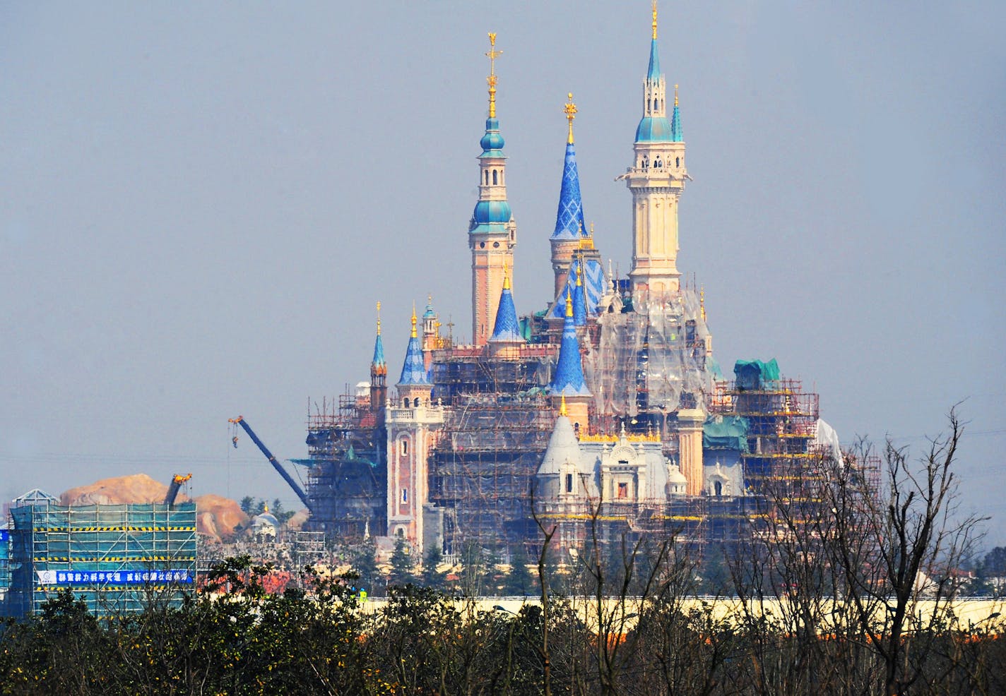 The castle is under construction at the Shanghai Disney Resort in Pudong, Shanghai, China, 27 February 2016. The Shanghai Disneyland is currently scheduled to open in June 2016, and it will be the first mainland China Disney resort. Right now, the gigantic park is hoping for that opening, but some financial issues and delays may cause that to be pushed back a bit. Reports are now coming out that the amount of money being spent to build Shanghai Disneyland are causing financial issues at domestic