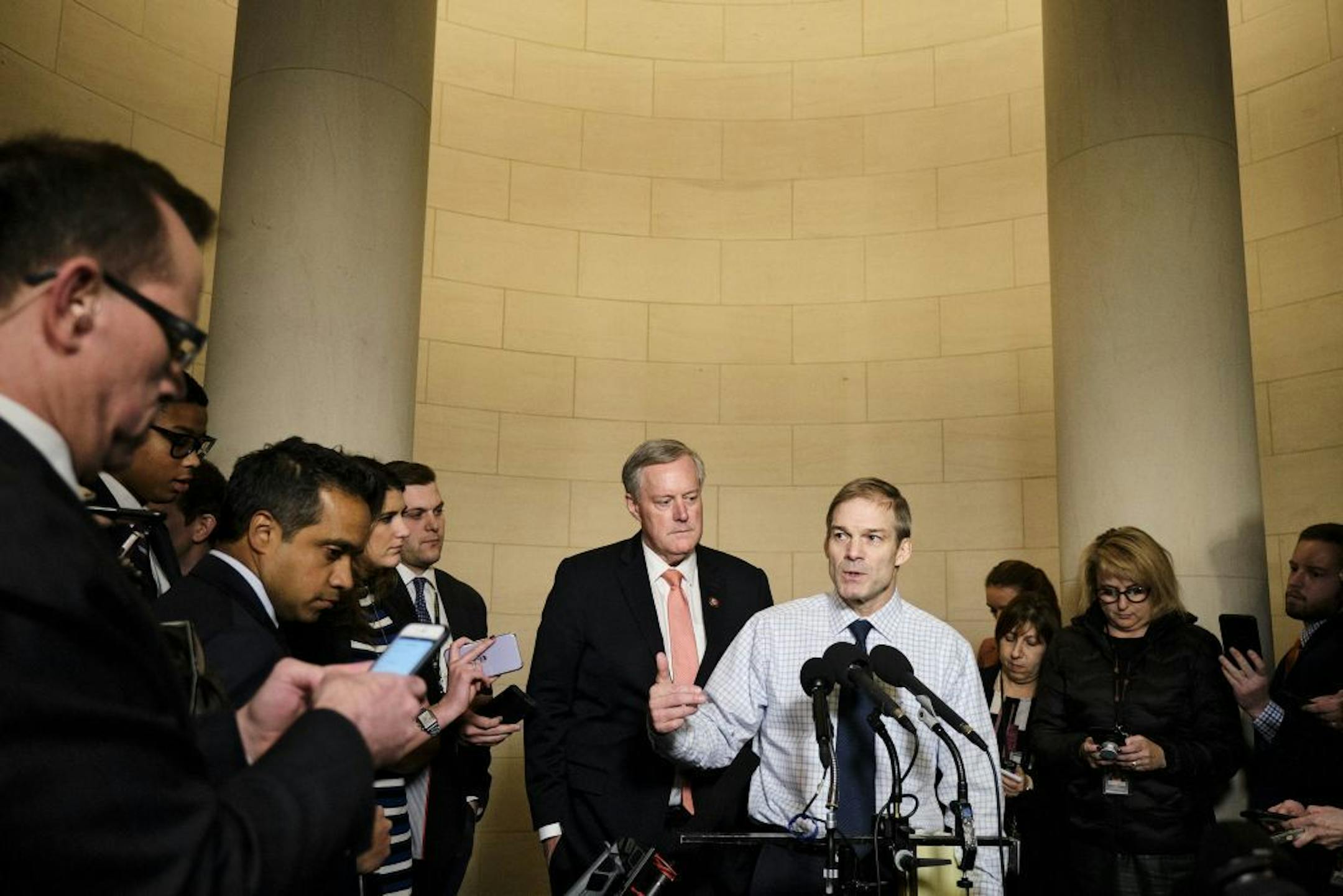 Rep. Jim Jordan (R-Ohio), center, and Rep. Mark Meadows (R-N.C.) speak to reporters after a House Intelligence Committee on the impeachment inquiry in Washington on Thursday, Nov. 21, 2019. The House Intelligence Committee, led by its chairman, Rep. Adam Schiff (D-Calif.) is examining the case for impeaching President Donald Trump.