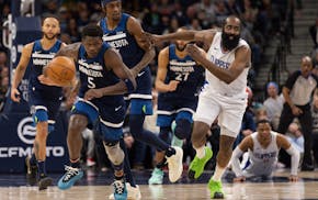 Minnesota Timberwolves guard Anthony Edwards (5) and Los Angeles Clippers guard James Harden, right, run downcourt for the ball during the second half