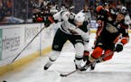 Wild center Eric Staal boxes out Ducks center Ryan Getzlaf on Friday.