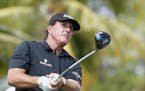 Phil Mickelson hits from the 11th tee during the first round of the Cadillac Championship golf tournament, Thursday, March 3, 2016, in Doral, Fla. (AP