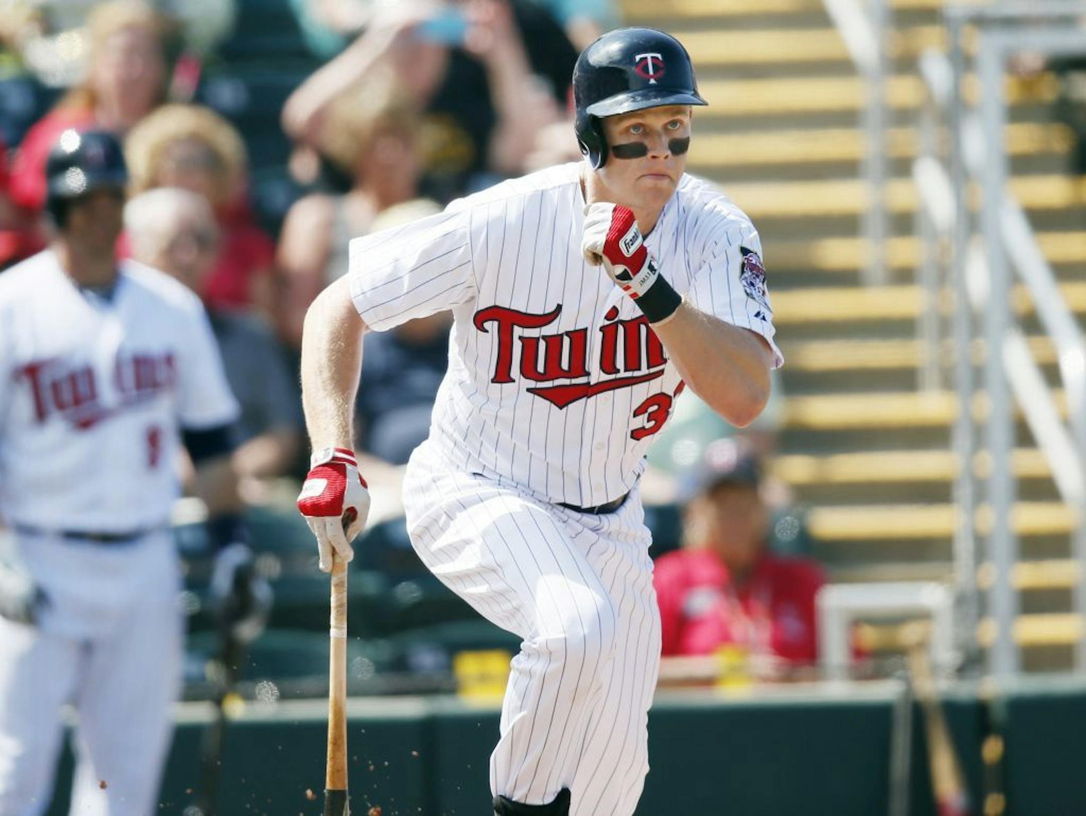Twins Justin Morneau has had back stiffness, but he played in an early, minor league game Saturday and seemed to be ready for Monday's home opener. He's shown here in a game on Feb.28, 2013 at Hammond Stadium in Fort Myers, Fla.