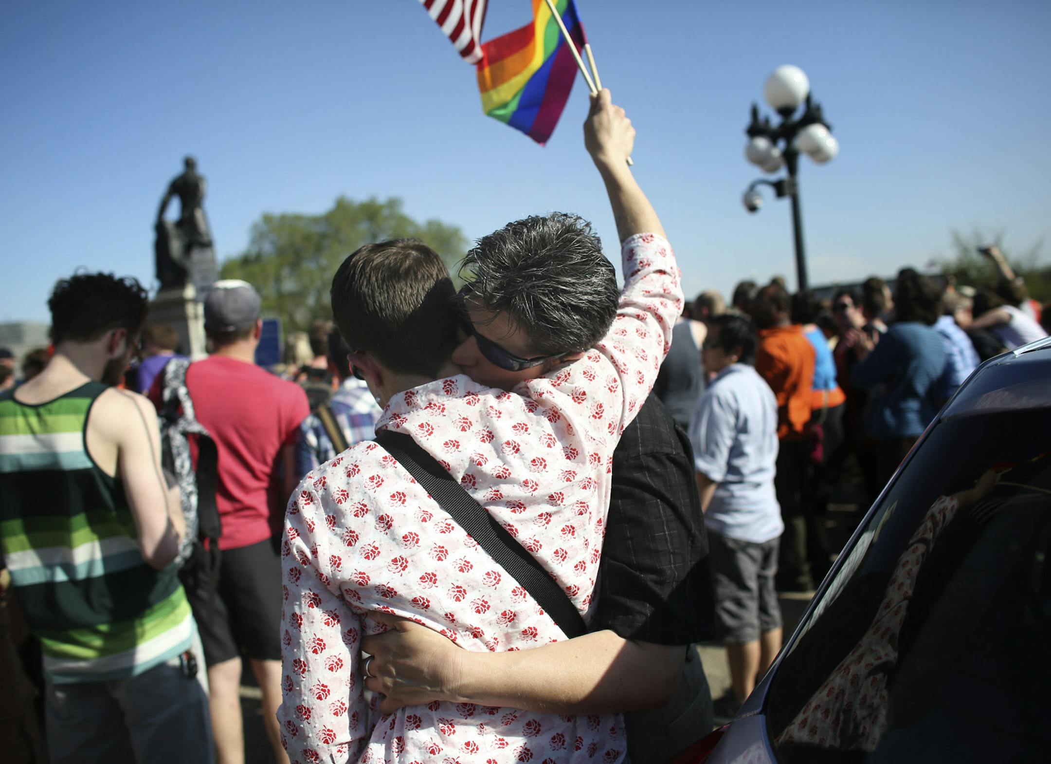 Amy Ruzick , right, kissed Christy Lillibridge on the Capitol steps during the signing of the same-sex marriage bill in St Paul, Min., Tuesday, May 14, 2013. Gov. Mark Dayton signed a measure to legalize same-sex marriage making Minnesota the 12th state to do so. ] (KYNDELL HARKNESS/STAR TRIBUNE) kyndell.harkness@startribune.com