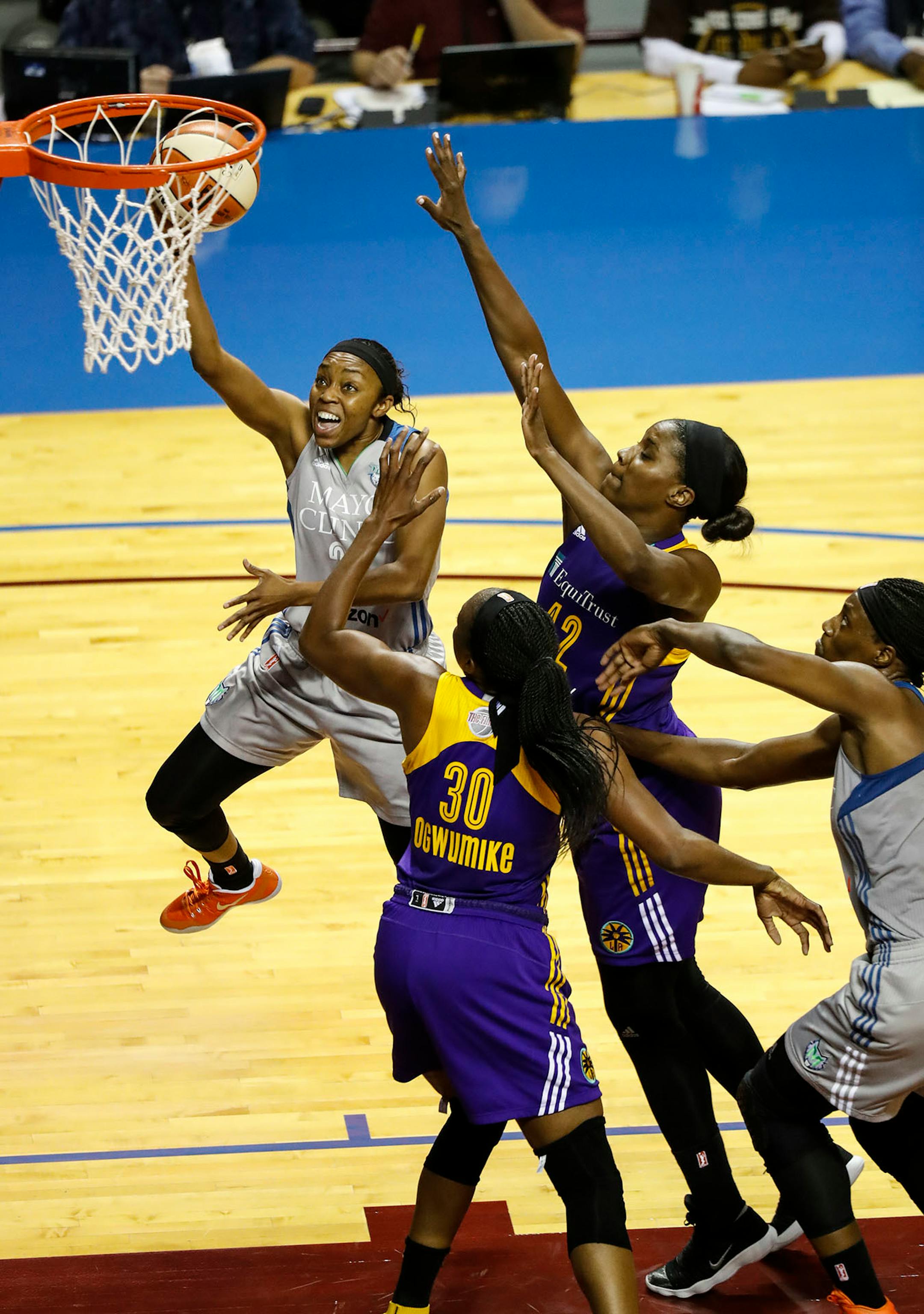 Minnesota Lynx guard Renee Montgomery (21) jumped for a shot in the second half. The Sparks won 85-84.