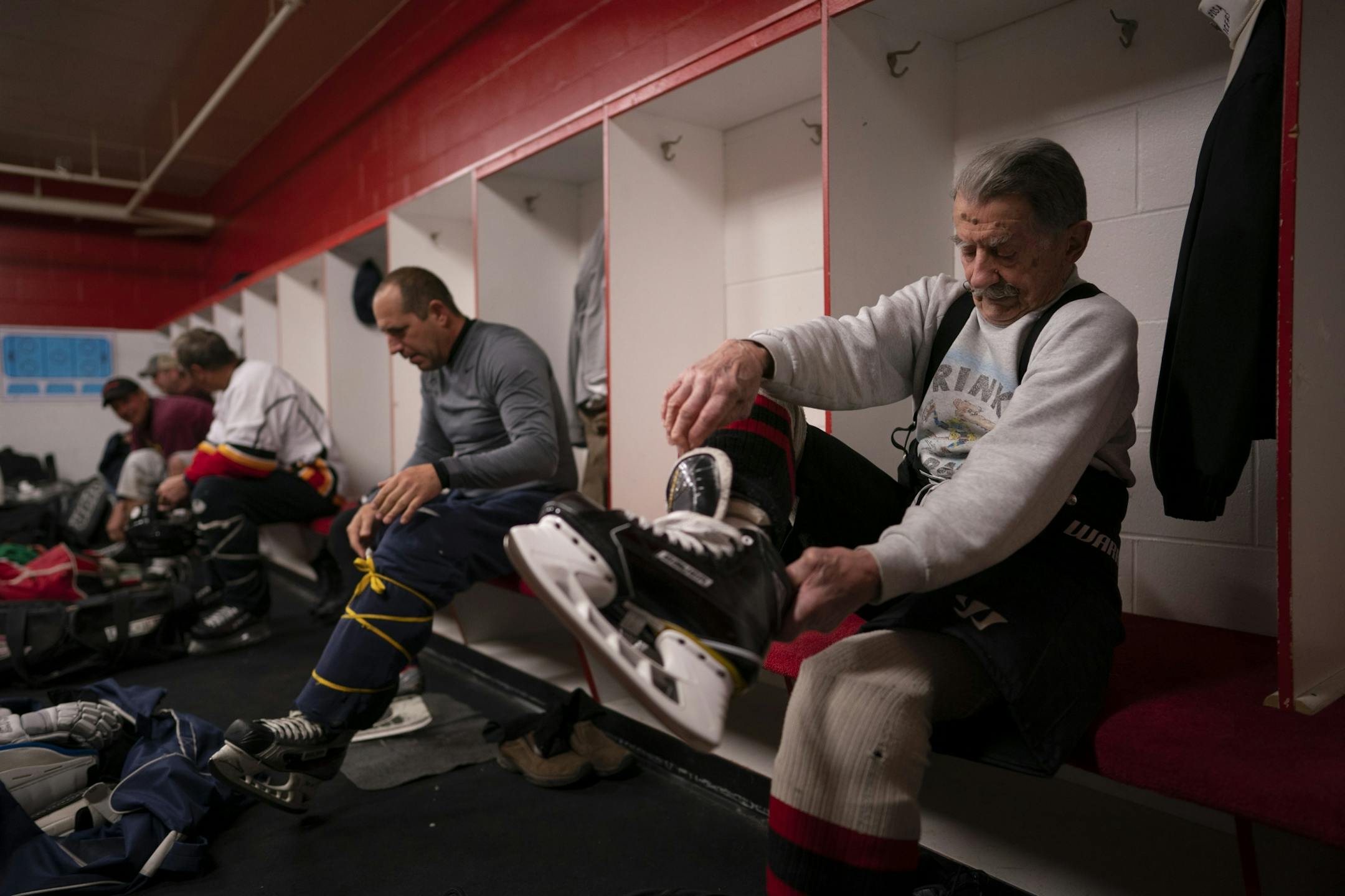 Mark Sertich got his skates on before his morning hockey game Thursday.