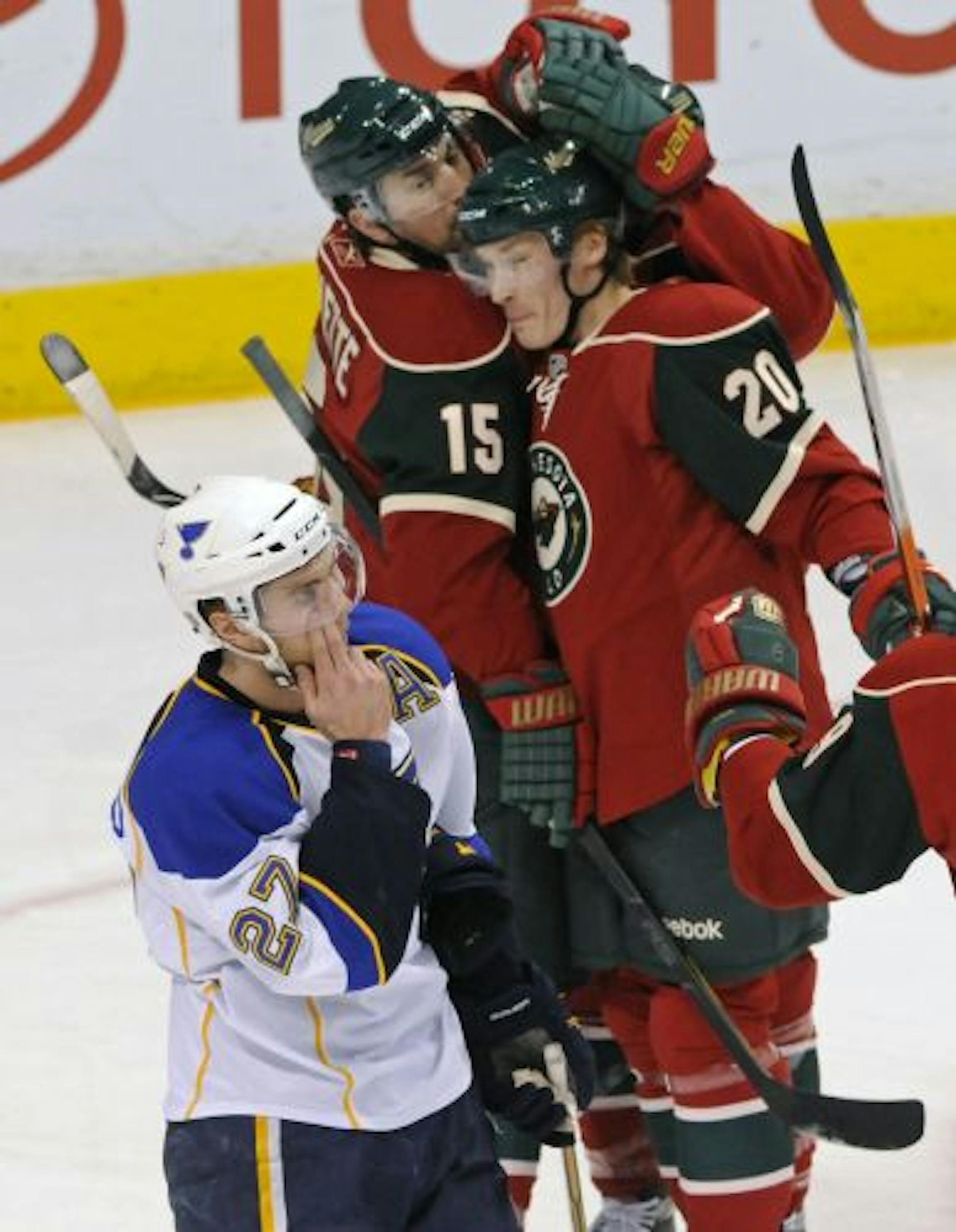 Antti Miettinen (20) was congratulated by Andrew Brunette after scoring an early Wild goal, but such highlights were rare Saturday night at Xcel Energy Center.