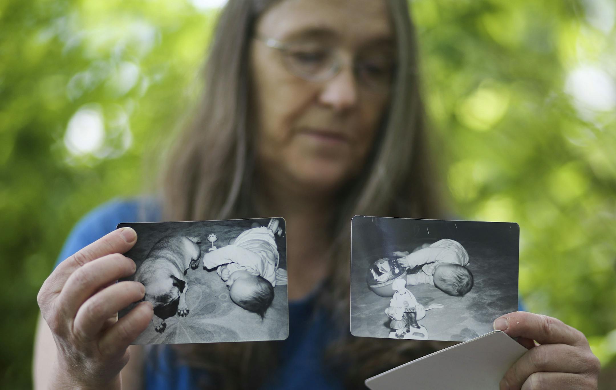 Susan Pagnac keeps a bag full of photos and keepsakes from her daughter Amy who disappeared 25 years ago. Pagnac shared them outside the family home Friday, June 13, 2014, in Maple Grove, MN.] (DAVIDJOLES/STARTRIBUNE) djoles@startribune.com It's been 25 years since 13-year-0ld Amy Pagnac disappeared. Now her mother Susan Pagnac keeps a bag full of photos and keepsakes from Amy.