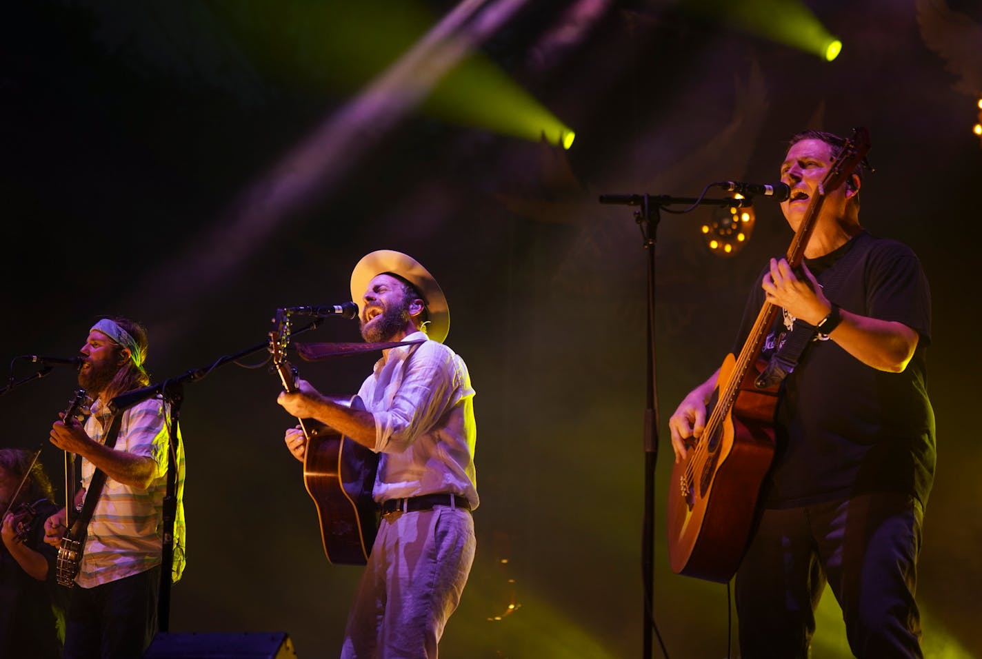 Trampled By Turtles members, including, from left, Dave Carroll, Dave Simonett, and Tim Saxhaug, tore into the first song of their set in just their second show since their return to touring post-pandemic.