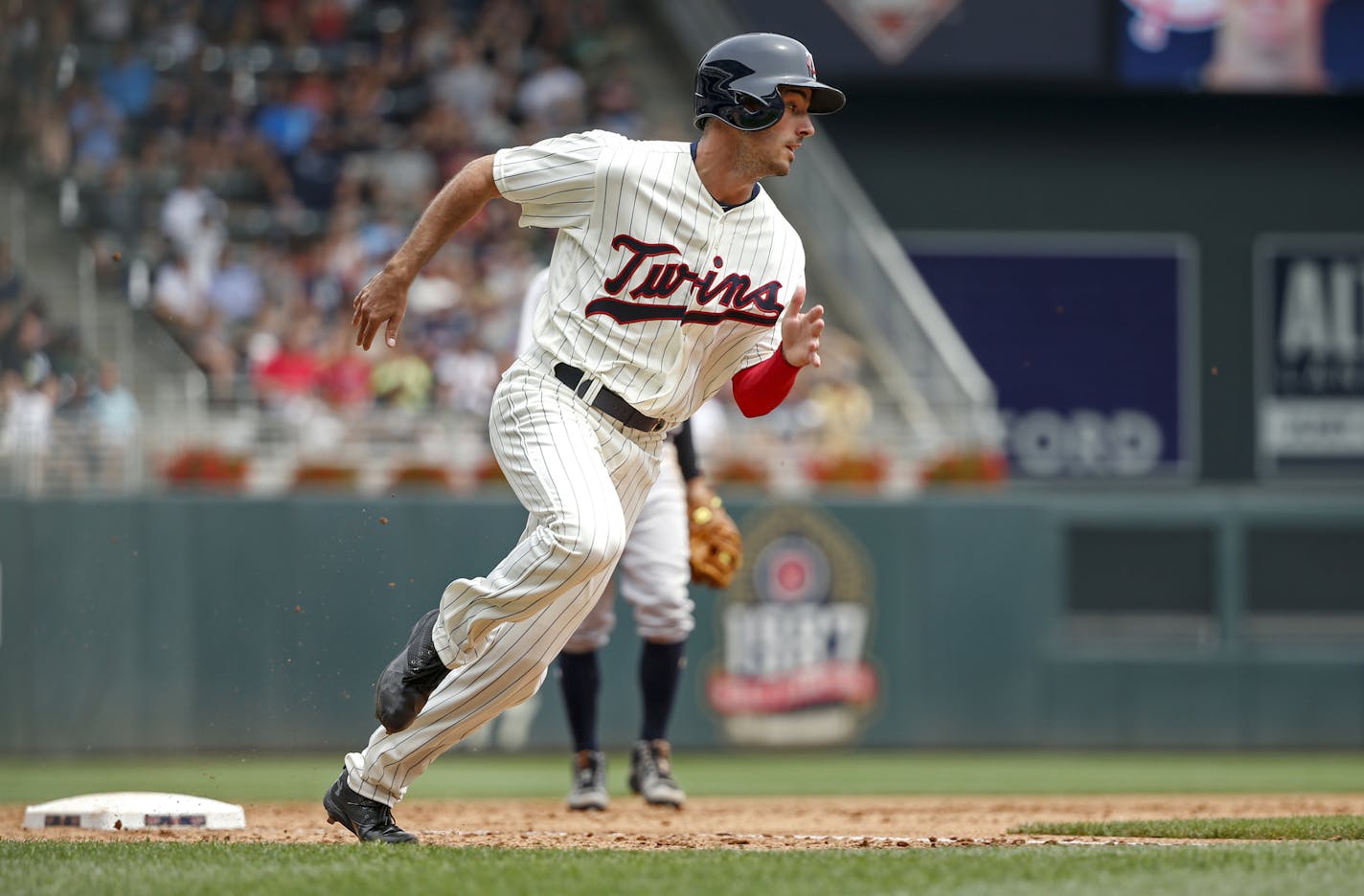 Minnesota Twins Zack Granite rounds third base on his way to score against the New York Yankees on a single by Eduardo Escobar in the second inning of a baseball game Wednesday, July 19, 2017, in Minneapolis. The Twins won 6-1. (AP Photo/Bruce Kluckhohn)