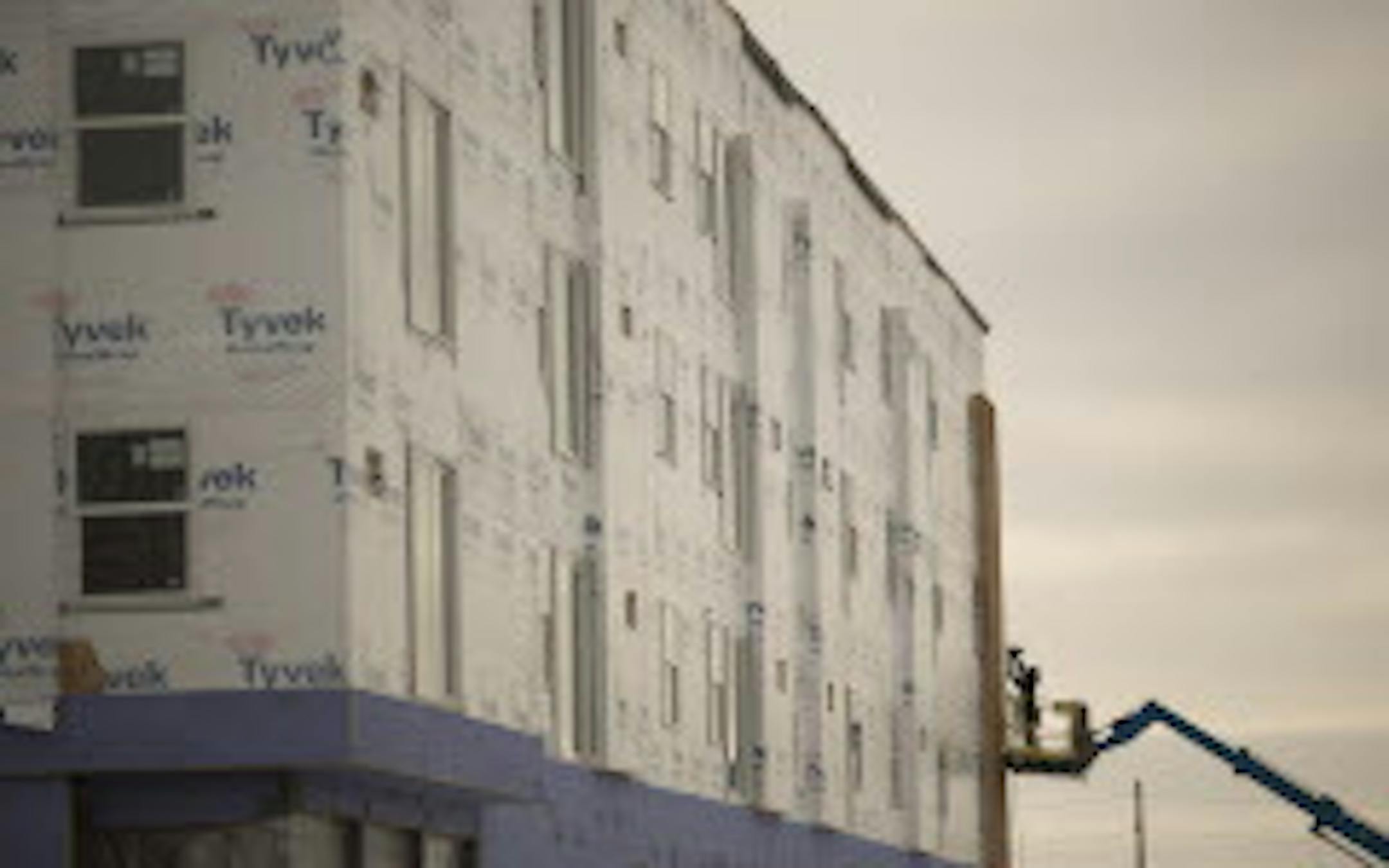 Work in the Bakken Oil Fields of North Dakota has brought an influx of thousands or workers, making North Dakota the fastest growing state in America. An 74-unit apartment building under contstruction near the Williston State College Tuesday morning, January 15, 2013. The housing project, funded in part by the Williston State College Foundation, will provide affordable housing for those who work in essential services, such as college staff, law enforcement, medical facilities and the school dist