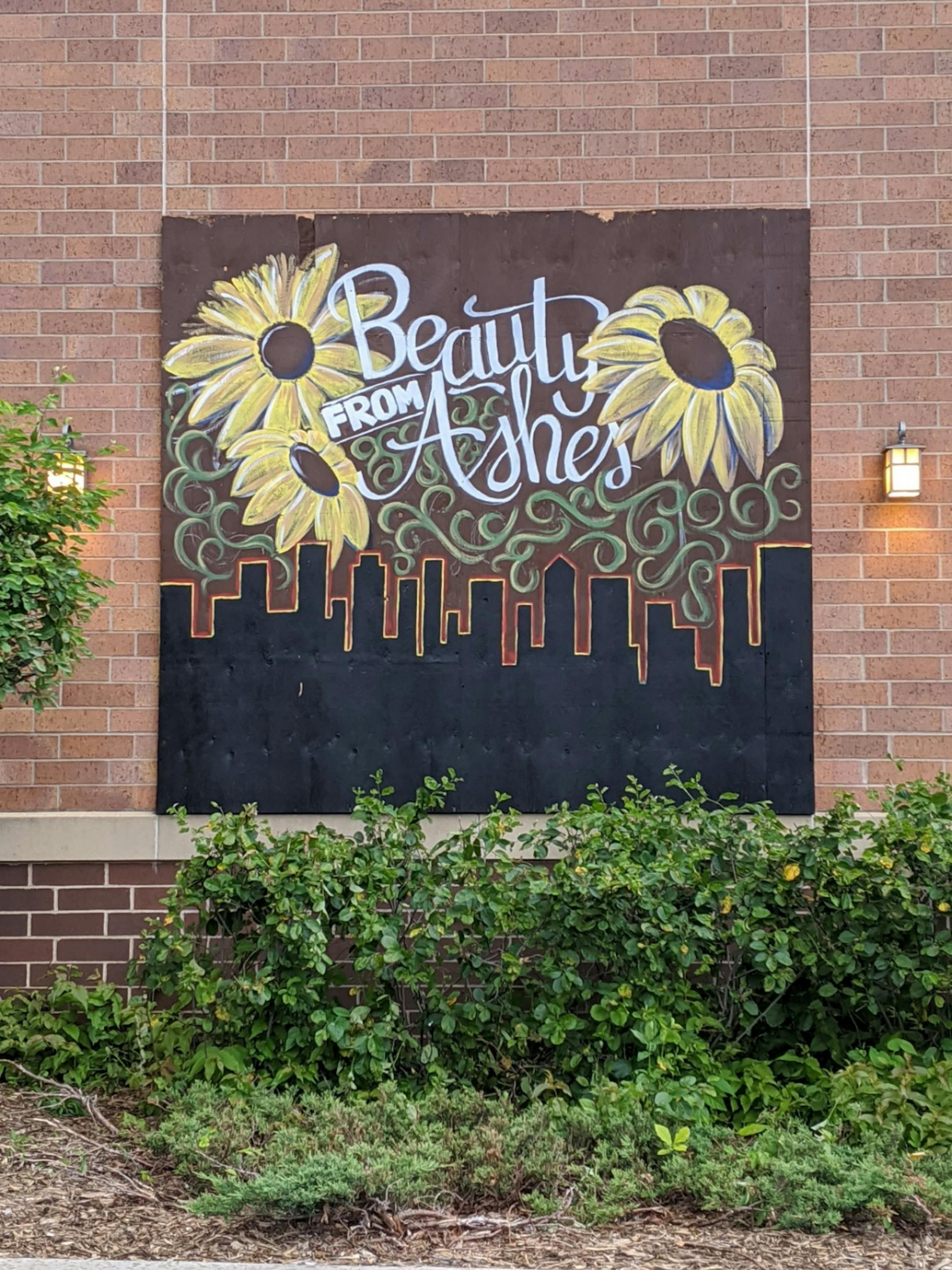 A mural on Aldi Food Market at 2100 Lake St. offers a message of beauty from the ashes in the wake of George FloydÕs killing by Minneapolis police.