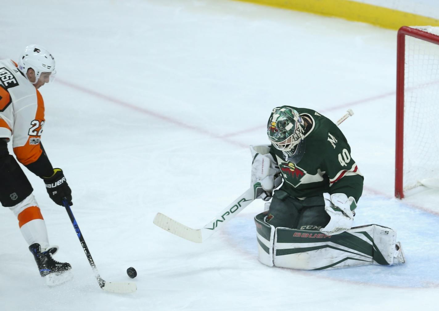 Philadelphia Flyers right wing Dale Weise (22) couldn't put in his rebound off the pads of Minnesota Wild goalie Devan Dubnyk in the third period after he was denied on a breakaway.