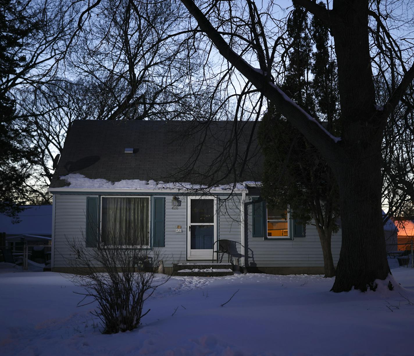 Unshoveled sidewalks in front of the house where Jerry Lee Curry allegedly abused his twin daughters until authorities removed the young women from the home last May.