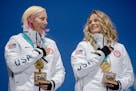 U.S. skiers Kikkan Randall, left, and Jessie Diggins of Afton, Minn., after winning the gold in the team sprint in Pyeonchang, South Korea, on Thursda