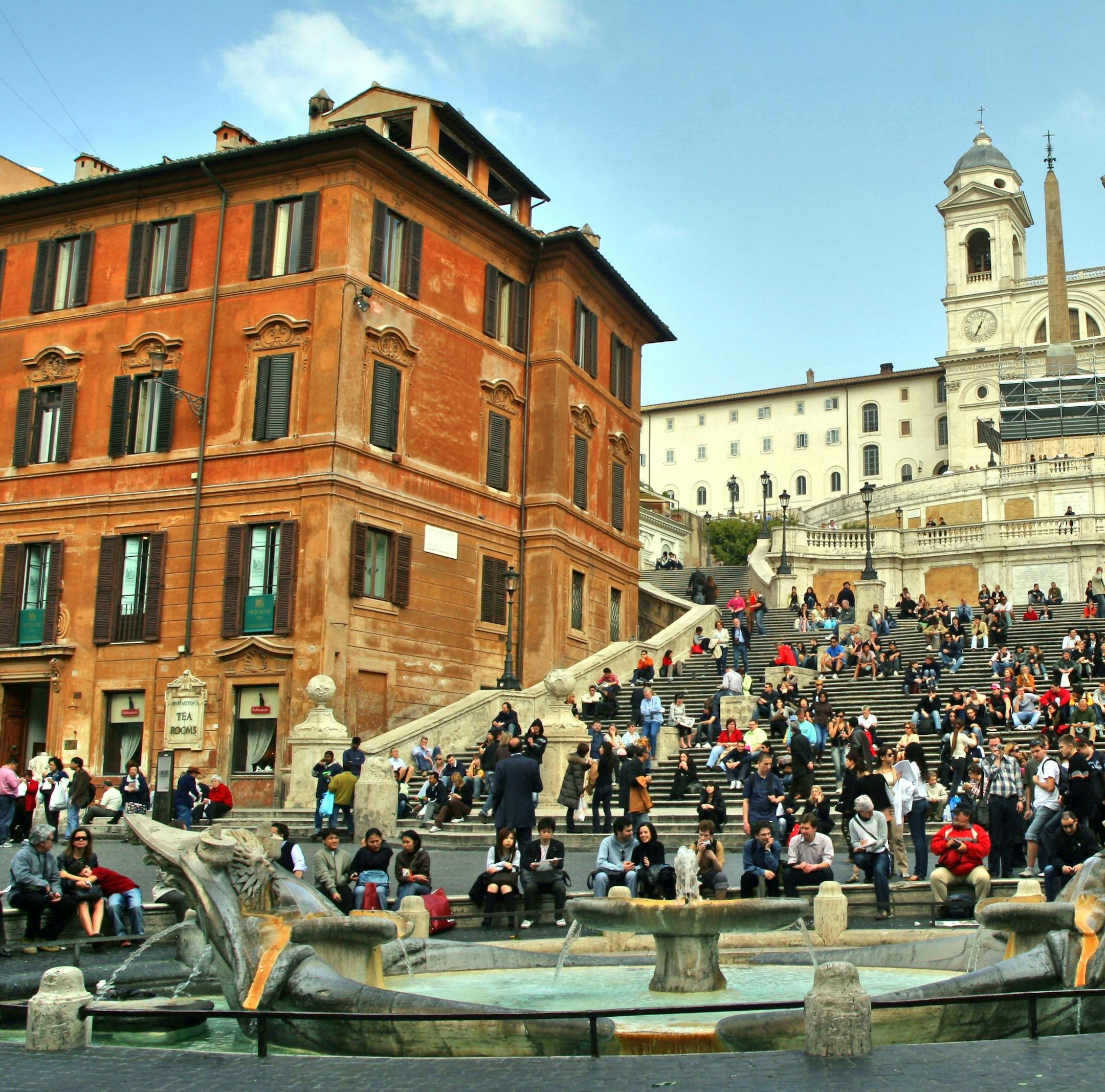 rome, latium, italy - March 6. 2007: romans and tourists sit on the spanish steps in rome, italy,