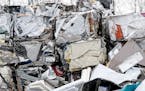 Recycled appliances at J.R.'s Advanced Recyclers are baled before leaving the recycler Thursday, Feb. 16, 2023 in Inver Grove Heights, Minn.
