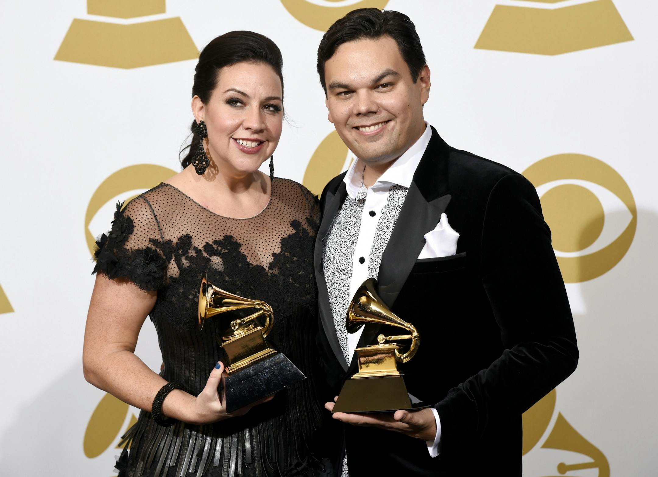 Kristen Anderson-Lopez, left, and Robert Lopez pose in the press room with the awards for best compilation soundtrack for visual media and best song written for visual media for "Let it Go" from �Frozen� at the 57th annual Grammy Awards at the Staples Center on Sunday, Feb. 8, 2015, in Los Angeles.