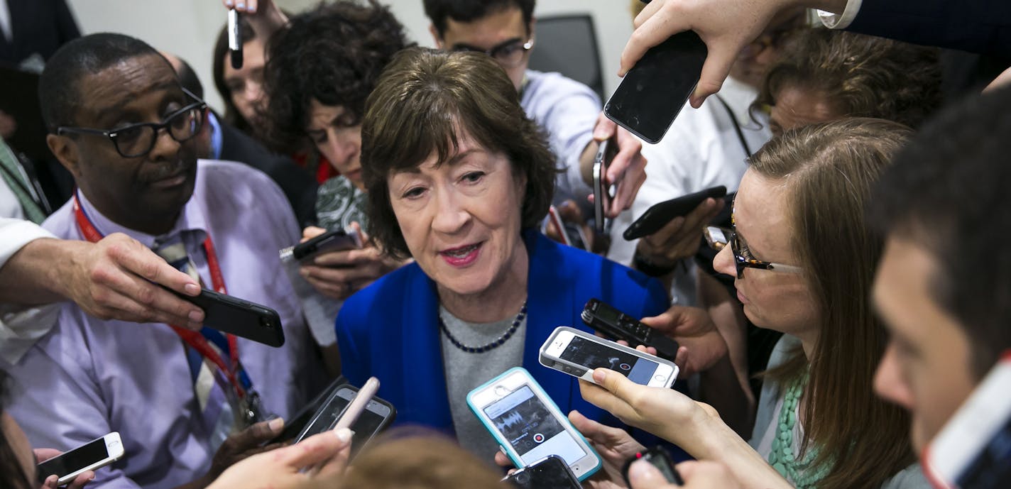 FILE -- Sen. Susan Collins (R-Maine) speaks to reporters on Capitol Hill in Washington, June 22, 2017. The Senate bill to repeal the Affordable Care Act was edging toward collapse as Republicans, including Collins, began peeling away after the nonpartisan Congressional Budget Office said that it would increase the number of people without health insurance by 22 million by 2026. (Al Drago/The New York Times)