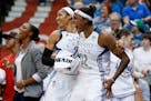 Lynx forward Rebekkah Brunson (32) celebrated with forward Maya Moore the closing minutes of the 94-70 victory over Seattle on June 11 at Target Cente